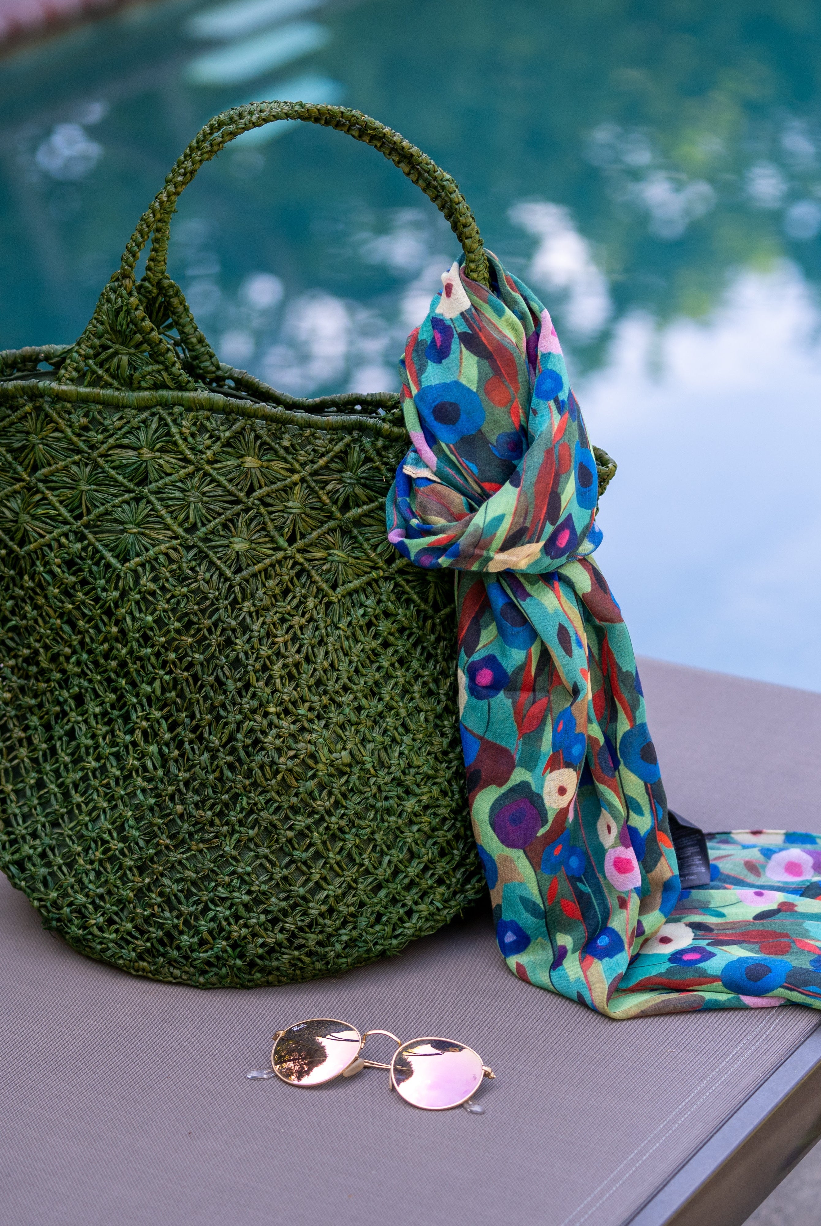 Luca Macrame Diamonds Crochet Straw Handbag handmade knotted natural raffia palm fiber in a solid hue of Deep Green forest/army/dark/green in a multi-texture circular pattern of concentric spiral links on the base, cross-hatch x pattern up 2/3rds of the bag, and geometric diamond flower pattern around the top third, with diamond pattern on the base of the shoulder strap handles with tubular loop handle tops - Shebobo (with Poppy Dreams Scarf Wrap)