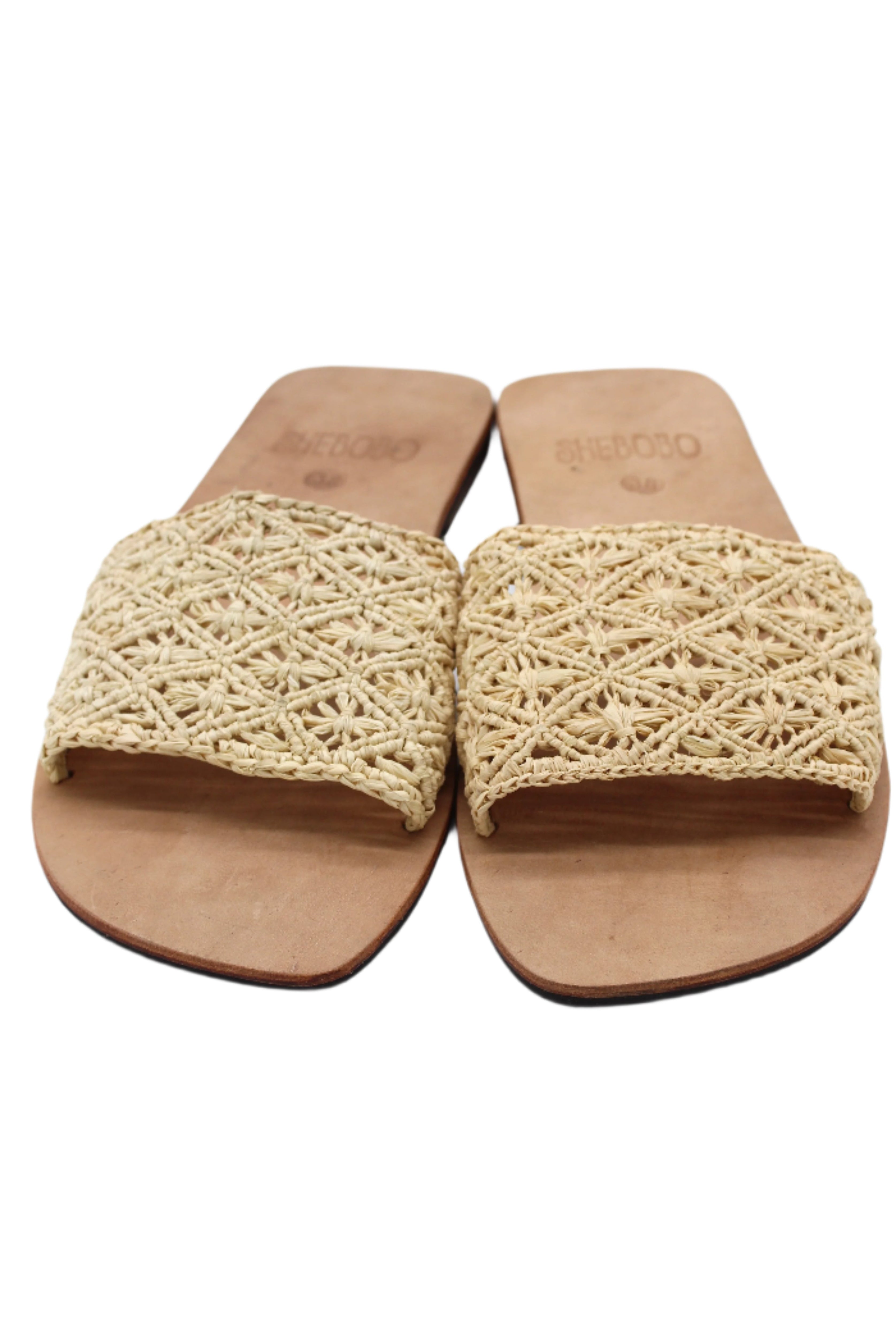 Front view Lulu Macrame and Crochet Diamond Straw Sandal Shoes handmade natural raffia palm fiber crochet and knotted macrame in a solid hue of natural straw color with geometric diamond or flower pattern in diagonal bands of texture on the top of the shoe and leather with rubber anti slip soles slide sandals - Shebobo