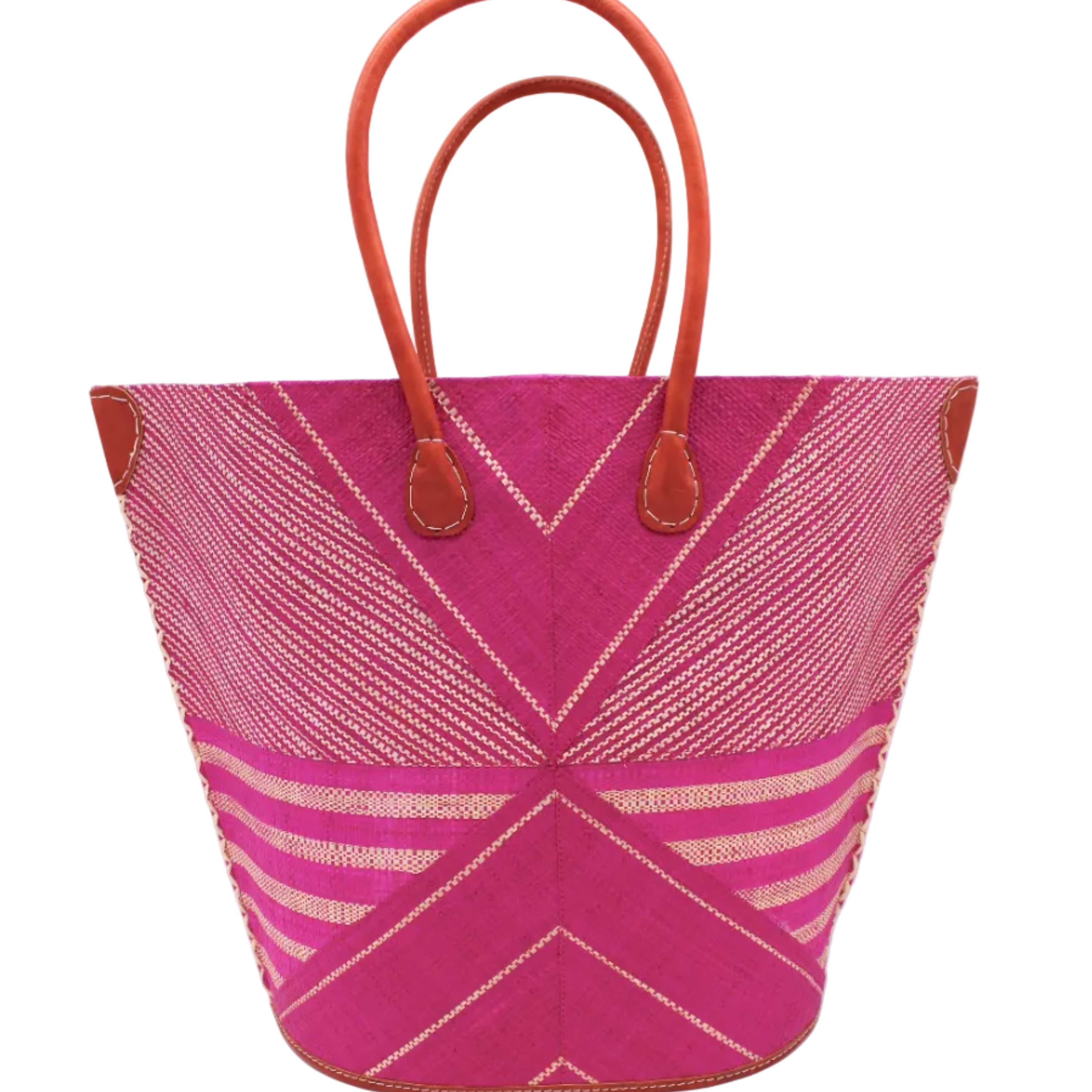 Mariposa Large Straw Tote Bag handmade loomed natural raffia palm fiber in a multi paneled pattern design of pinstripe, melange, and wide stripe combinations geometrically radiating from the center point of the bag outwards in a two tone color combination of Fuchsia hot/bright/barbie/pink and natural straw color with a solid hue of color on the back of the bag plus leather handles and embellishments shoulder bag - Shebobo