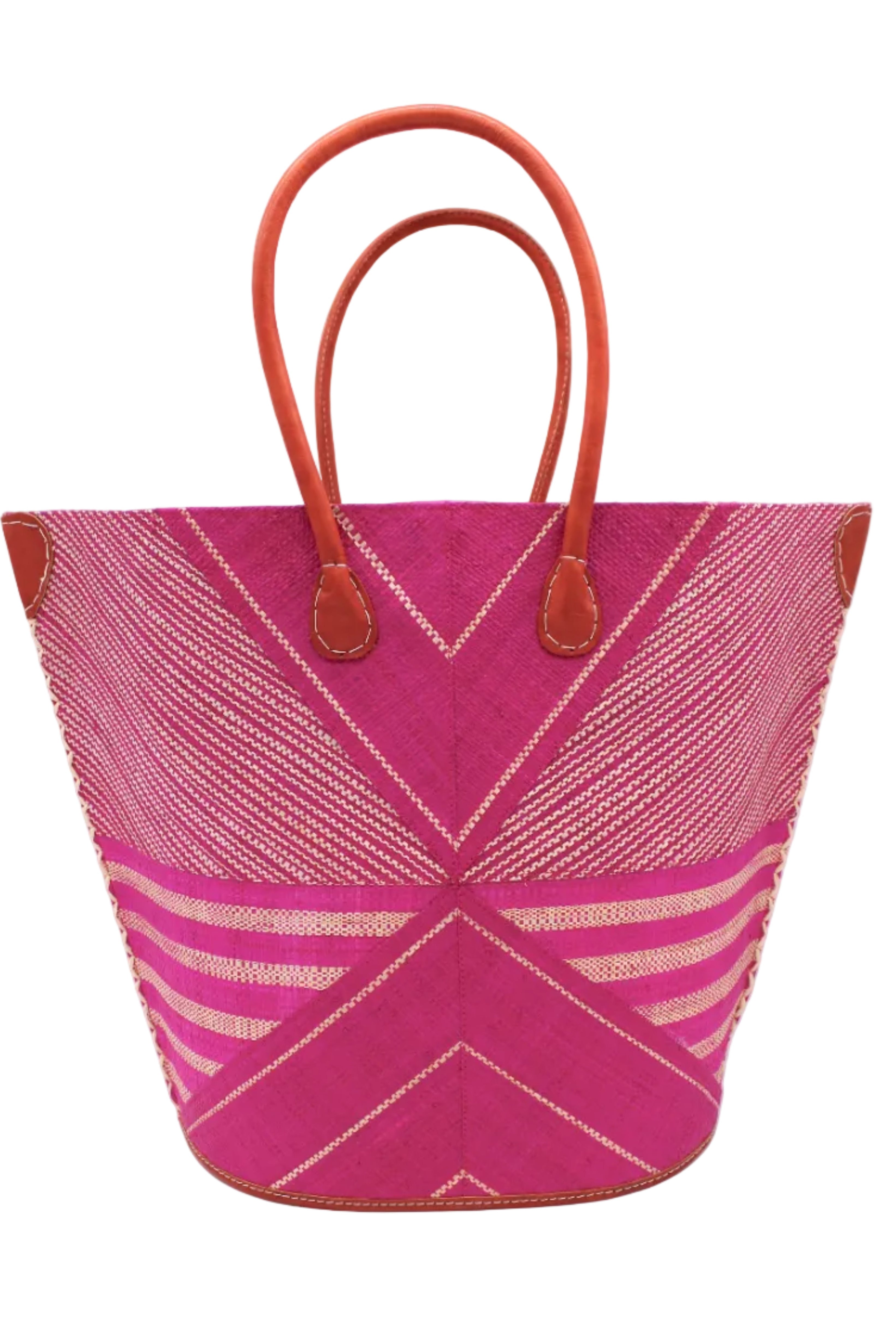 Mariposa Large Straw Tote Bag handmade loomed natural raffia palm fiber in a multi paneled pattern design of pinstripe, melange, and wide stripe combinations geometrically radiating from the center point of the bag outwards in a two tone color combination of Fuchsia hot/bright/barbie/pink and natural straw color with a solid hue of color on the back of the bag plus leather handles and embellishments shoulder bag - Shebobo
