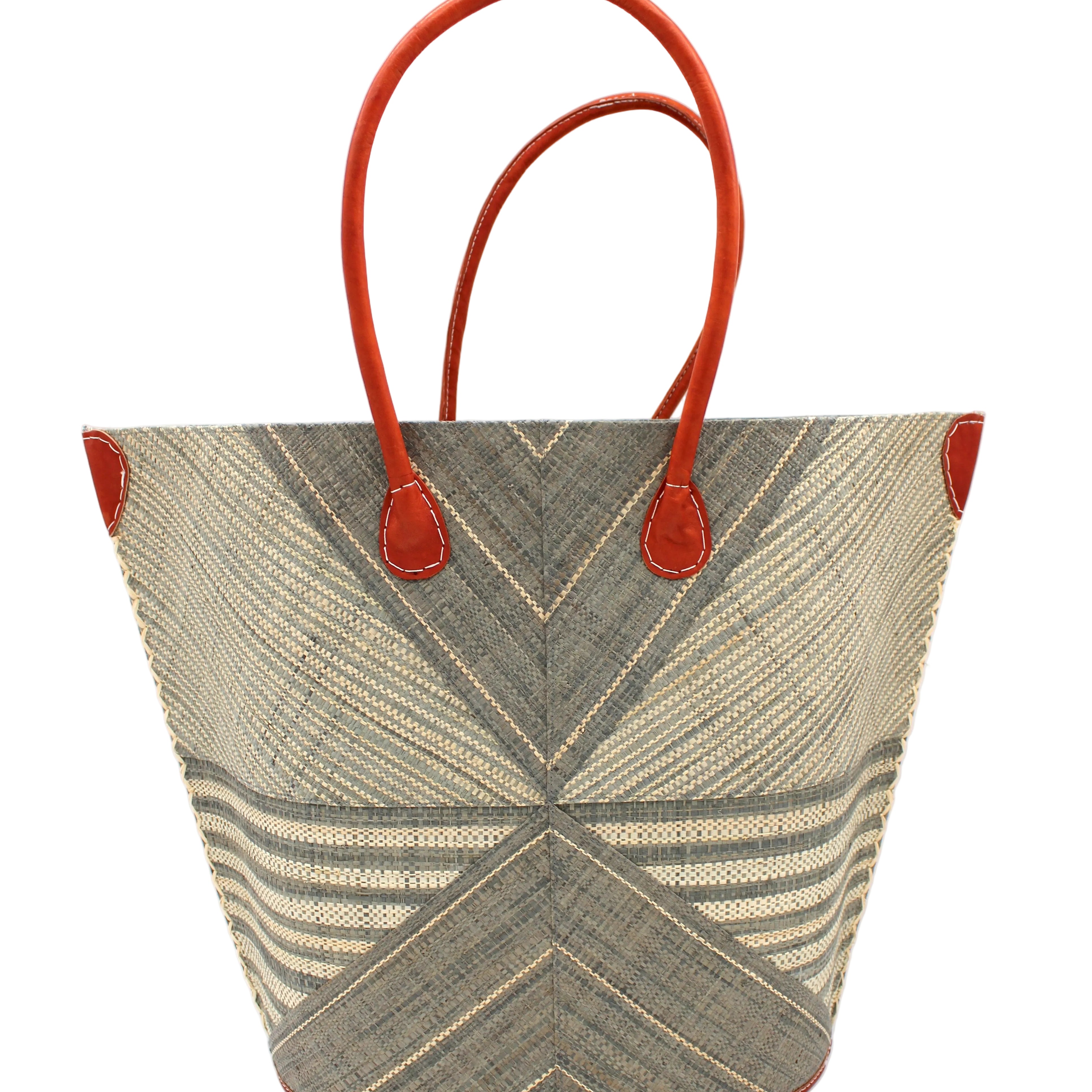 Mariposa Large Straw Tote Bag handmade loomed natural raffia palm fiber in a multi paneled pattern design of pinstripe, melange, and wide stripe combinations geometrically radiating from the center point of the bag outwards in a two tone color combination of Grey and natural straw color with a solid hue of color on the back of the bag plus leather handles and embellishments shoulder bag - Shebobo
