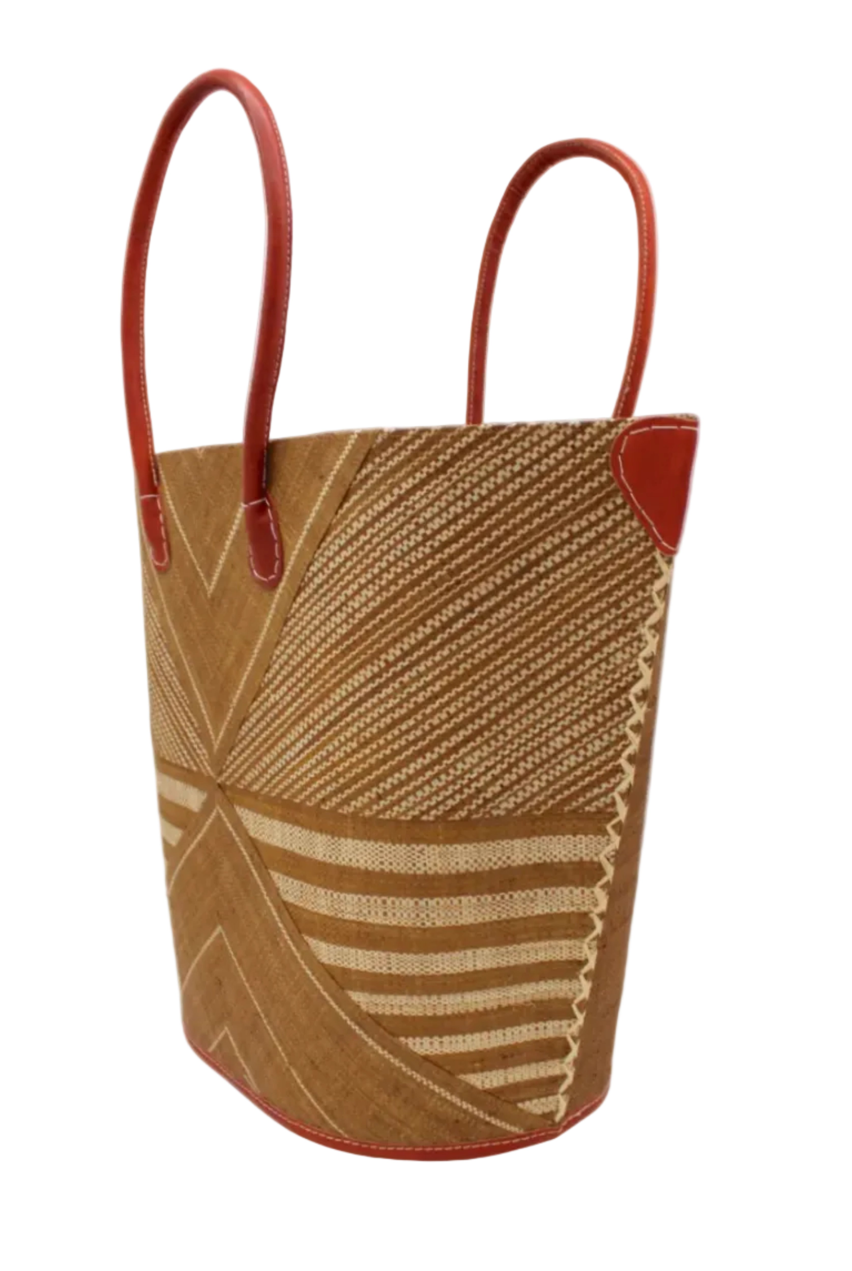 Side view Mariposa Large Straw Tote Bag handmade loomed natural raffia palm fiber in a multi paneled pattern design of pinstripe, melange, and wide stripe combinations geometrically radiating from the center point of the bag outwards in a two tone color combination of Tobacco cinnamon/dark/brown and natural straw color with a solid hue of color on the back of the bag plus leather handles and embellishments shoulder bag - Shebobo