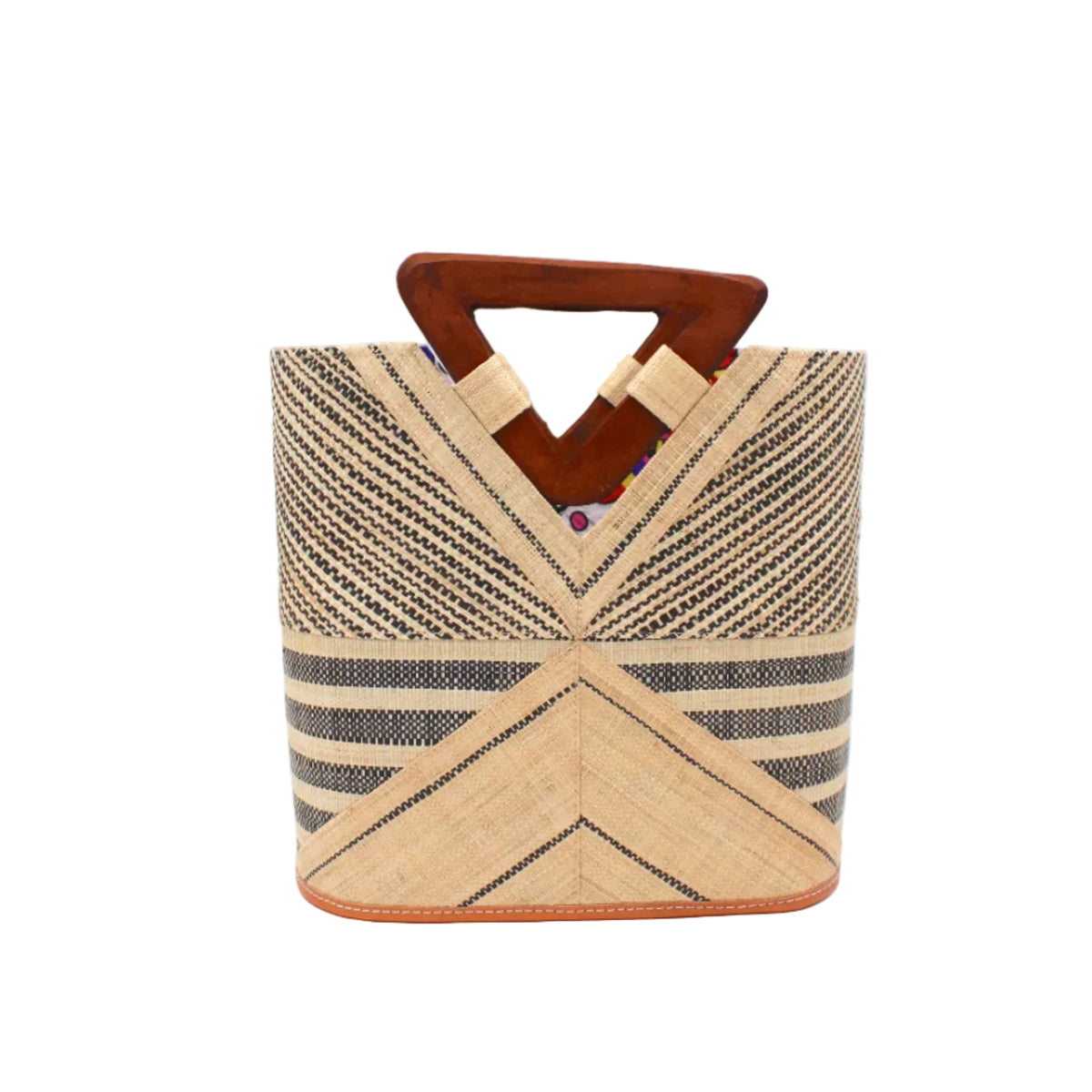 Mariposa Zuki Raffia Straw Bucket Handbag with Wood Triangle Handles handmade loomed raffia palm fiber in a multi paneled pattern design of pinstripe, melange, and wide stripe combinations geometrically radiating from the center point of the bag outwards in a two tone color combination of Natural straw color and black with a solid hue of color on the back of the bag plus carved wooden handles purse - Shebobo