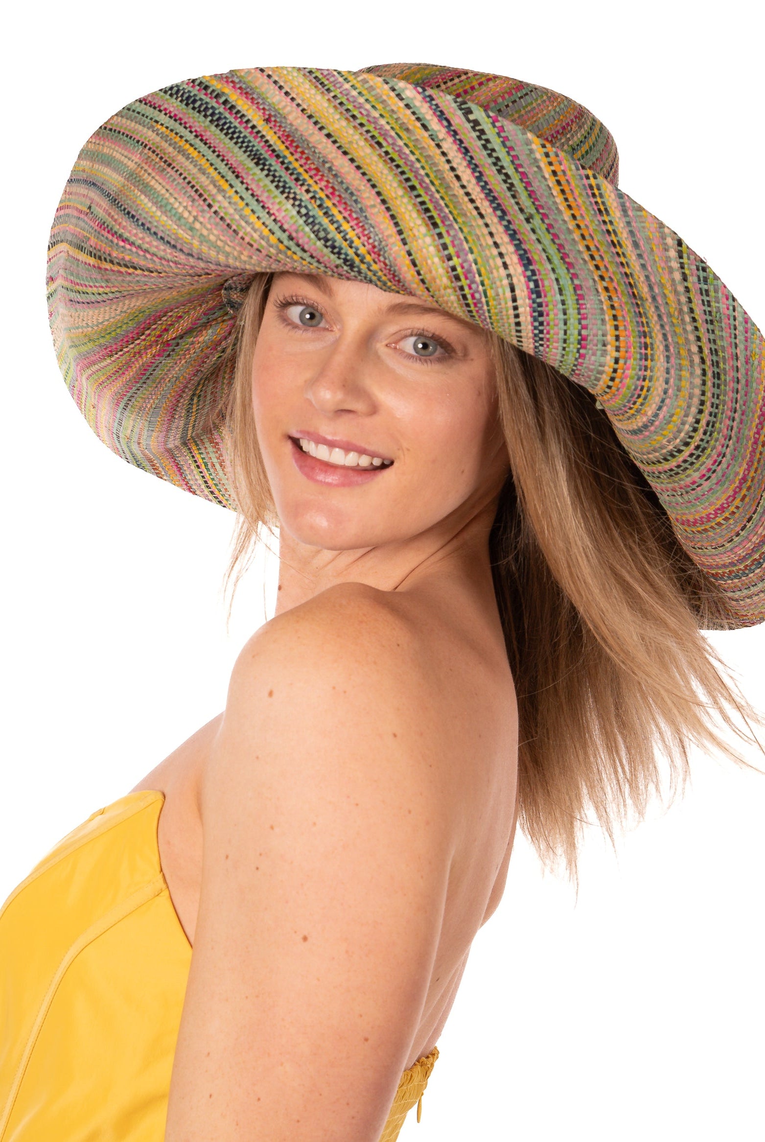 Model wearing Monica 7" Wide Brim Seafoam Multi Melange Packable Straw Sun Hat multicolor heather pattern of seafoam blue/green, lime green, turquoise blue, yellow, navy blue, pink, fuchsia, coral orange/red, natural straw color, etc. - Shebobo