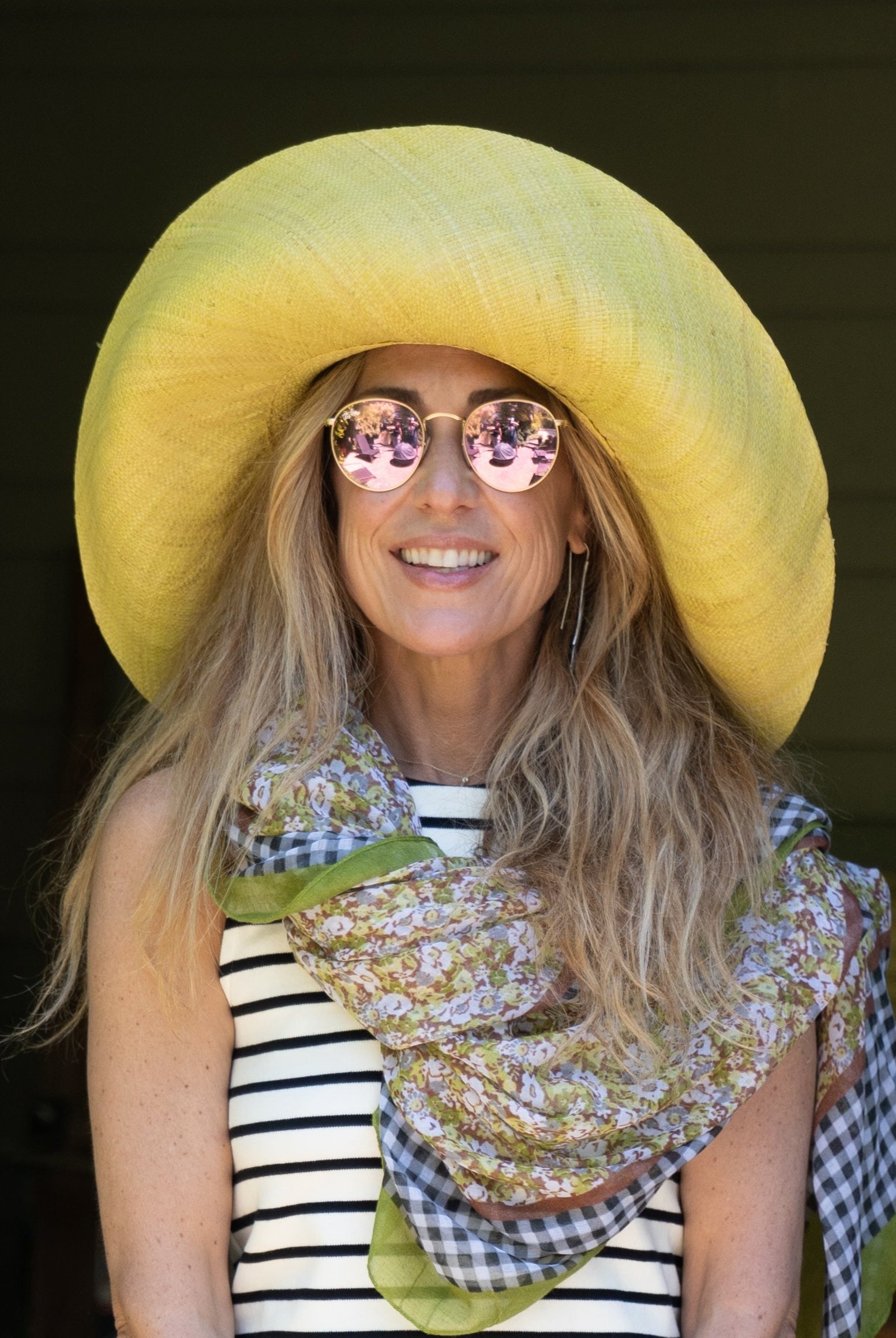 Model wearing Monica 5" & 7" Wide Brim Solid Color Packable Straw Sun Hat handmade loomed raffia in a solid hue of butter light/yellow - Shebobo (with French Country Floral & Gingham Scarf)