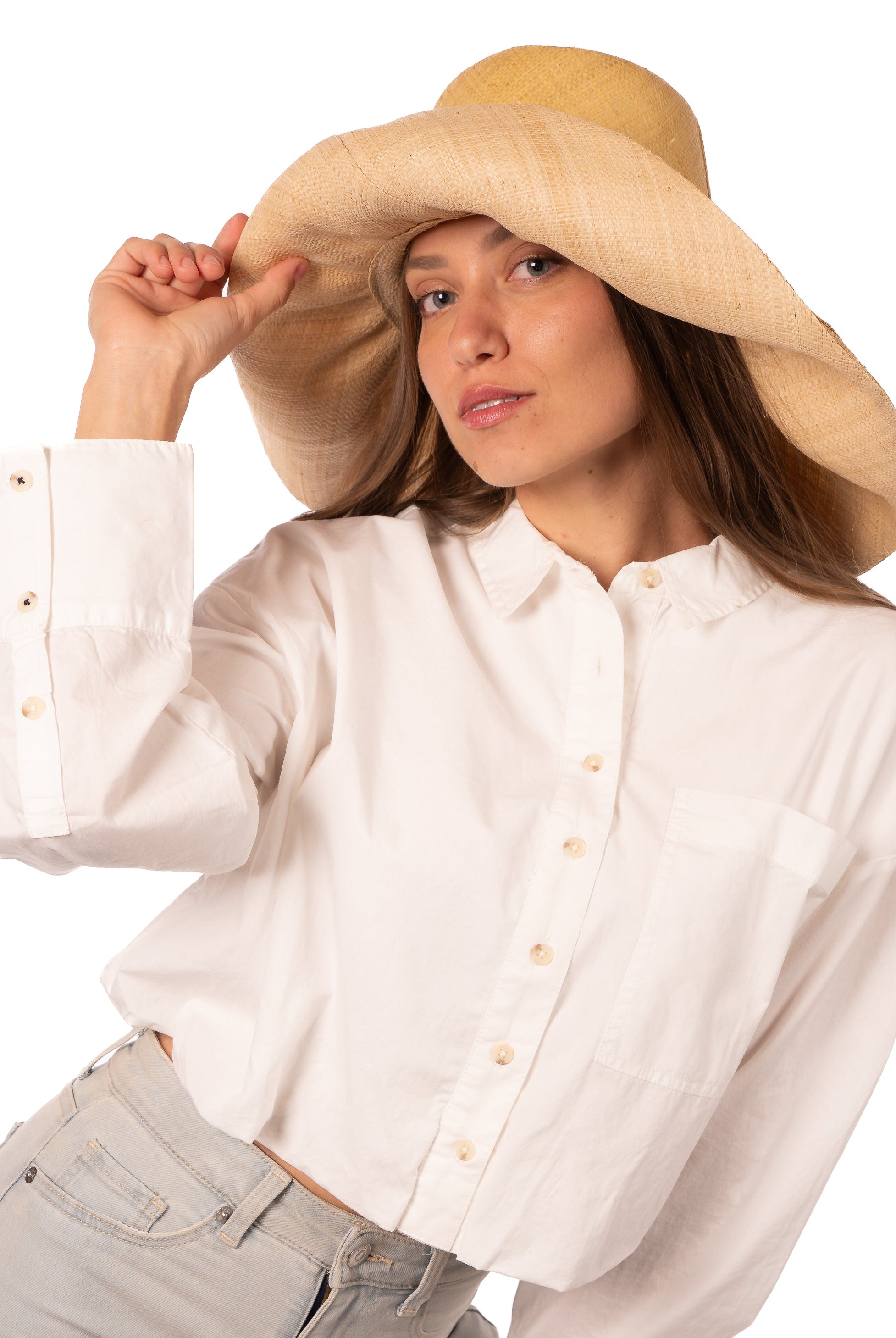 Model wearing Monica 7" Brim Two Tone Butter Straw Hat handmade loomed raffia color block pattern of the top half butter/light yellow and the bottom half natural straw color - Shebobo