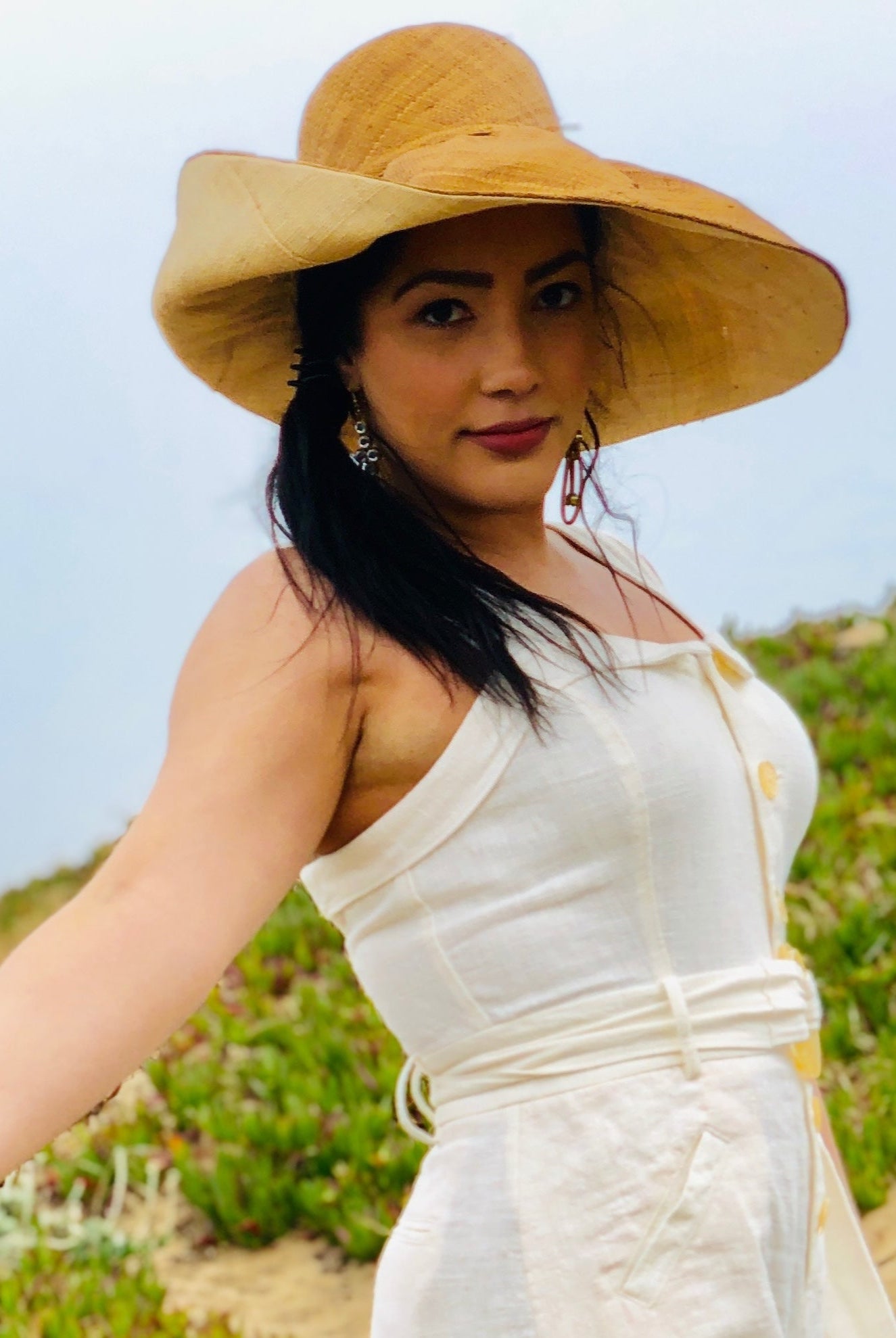 Model wearing Monica 7" Brim Two Tone Cinnamon Straw Hat handmade loomed raffia color block pattern of the top half cinnamon/tobacco/brown and the bottom half natural straw color - Shebobo