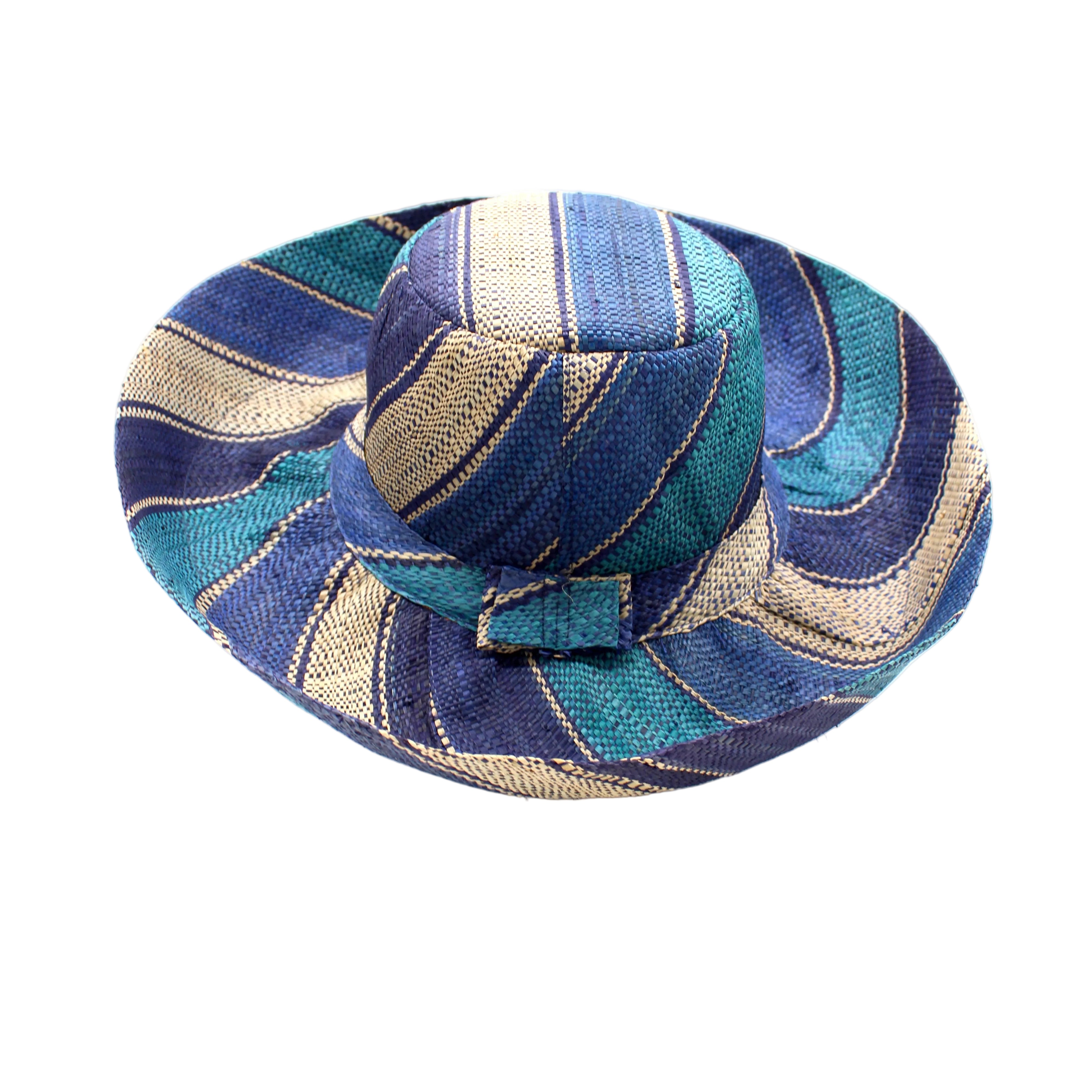 Monica 5" & 7" Wide Brim Blue Swirl Multicolor Stripe Pattern Packable Straw Sun Hat handmade loomed raffia in multi width bands of navy blue, turquoise blue, and natural straw color create a striped swirl pattern - Shebobo