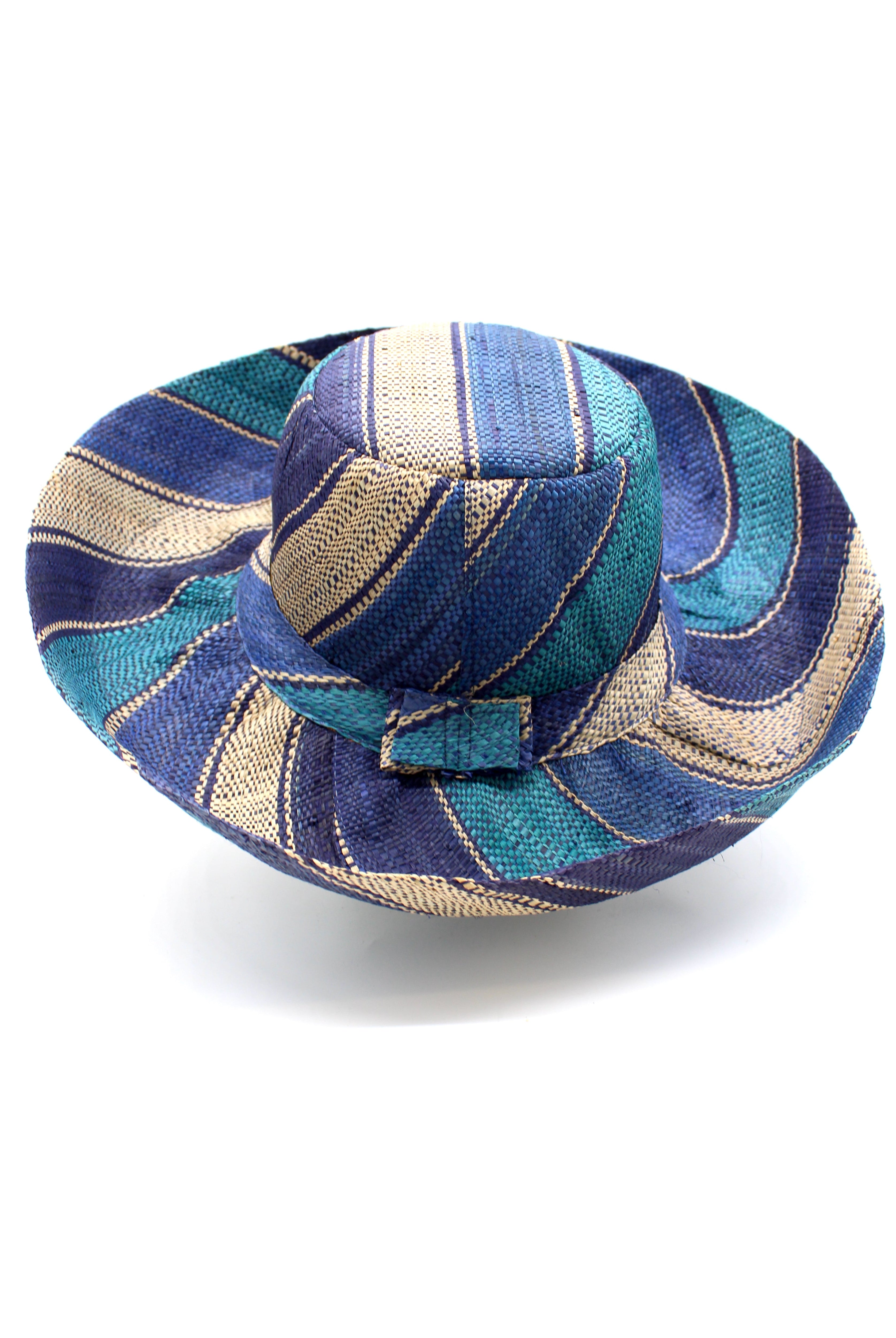 Monica 5" & 7" Wide Brim Blue Swirl Multicolor Stripe Pattern Packable Straw Sun Hat handmade loomed raffia in multi width bands of navy blue, turquoise blue, and natural straw color create a striped swirl pattern - Shebobo