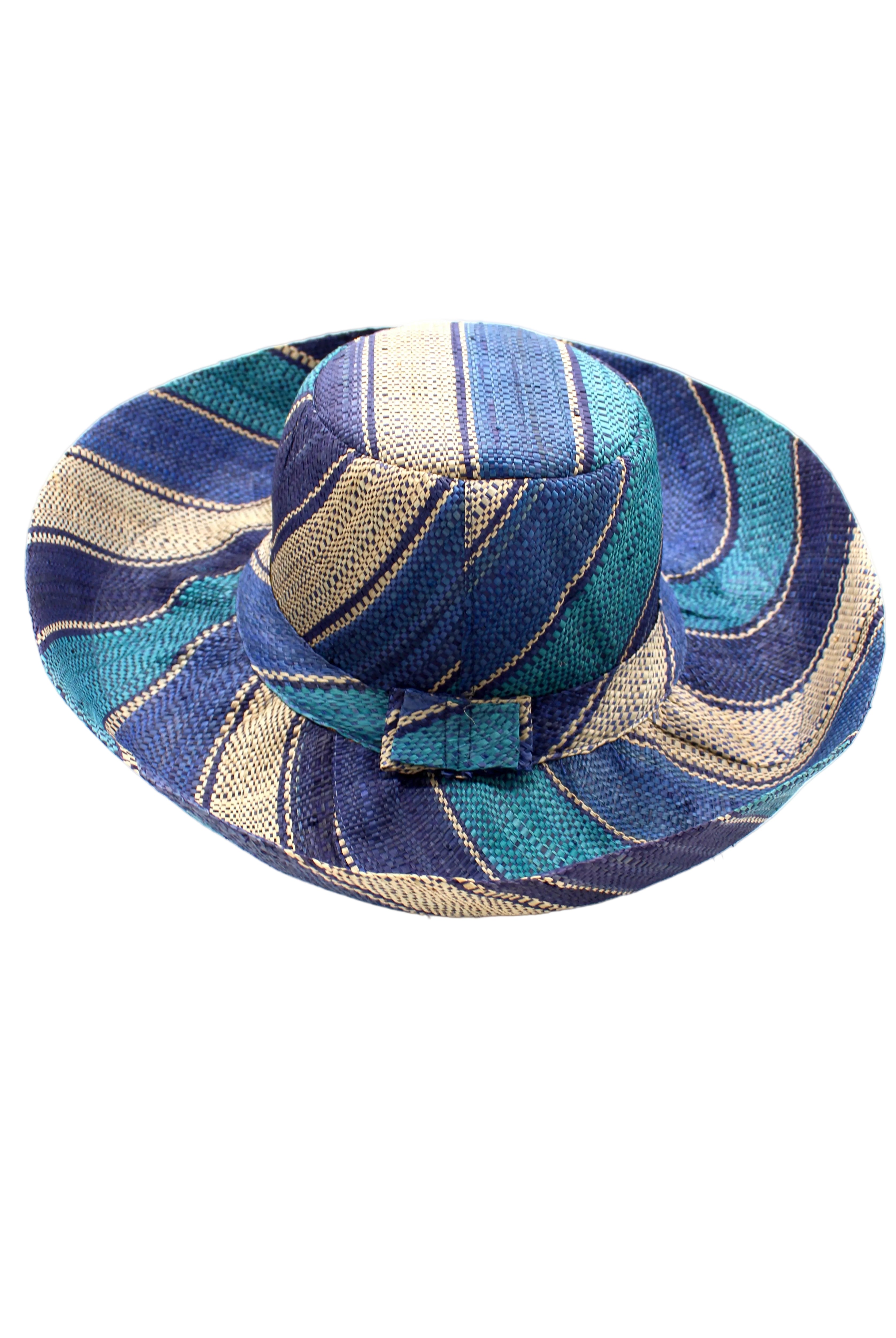 Monica 5" & 7" Wide Brim Blue Swirl Multicolor Stripe Pattern Packable Straw Sun Hat handmade loomed raffia in multi width bands of navy blue, turquoise blue, and natural straw color create a striped swirl pattern - Shebobo