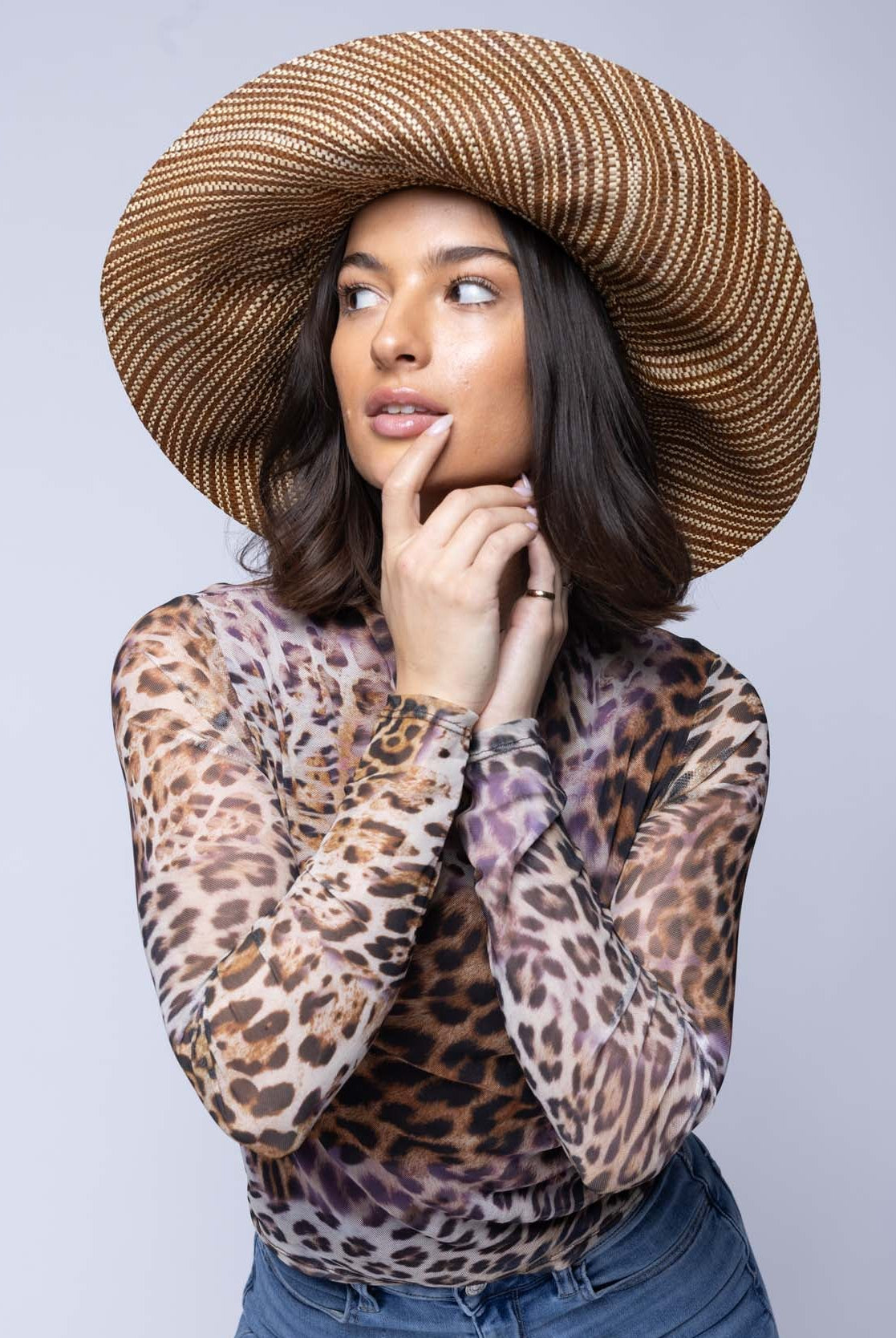 Model wearing Monica 5 inch or 7 inch Wide Brim Tobacco Two Tone Melange Packable Straw Sun Hat handmade loomed raffia in a multicolor heathered melange pattern of tobacco dark/cinnamon/brown and natural straw color creates a subtle swirl - Shebobo