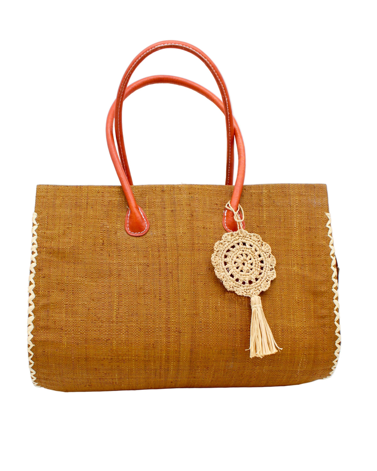 Monte Carlo Big Straw Beach Bag with Dreamcatcher Tassel Charm Embellishment handmade loomed raffia palm fiber in a solid hue of cinnamon tobacco/dark/brown with contrasting crosshatch stitch edging in natural straw color with matching crochet dreamcatcher disc and tuft tassel charm embellishment and leather handles oversized large handbag shoulder bag - Shebobo