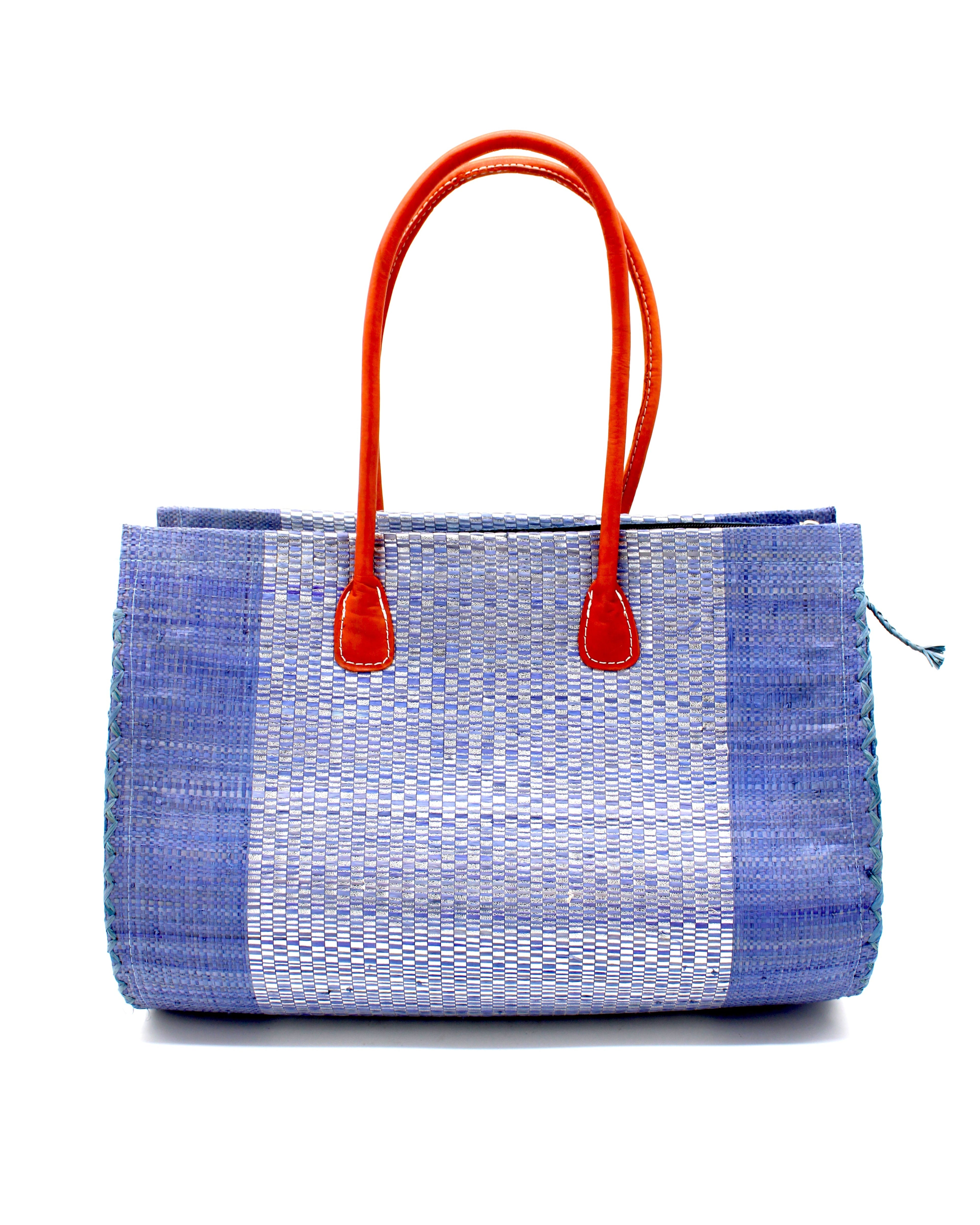 Monte Carlo Wynwood Big Straw Beach Bag with Metallic Detailing Denim Shoulder Bag handmade loomed raffia palm fiber in a solid hue of denim retro/light blue with incorporated woven in vegan leather silver metallic strands and leather handles purse - Shebobo
