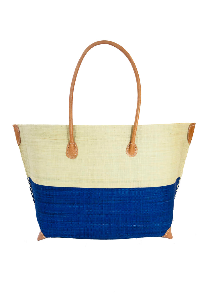 Monterey Two Tone Straw Tote Bag handmade loomed raffia fibers in a color block pattern of natural straw colored upper half, and navy blue lower half - Shebobo