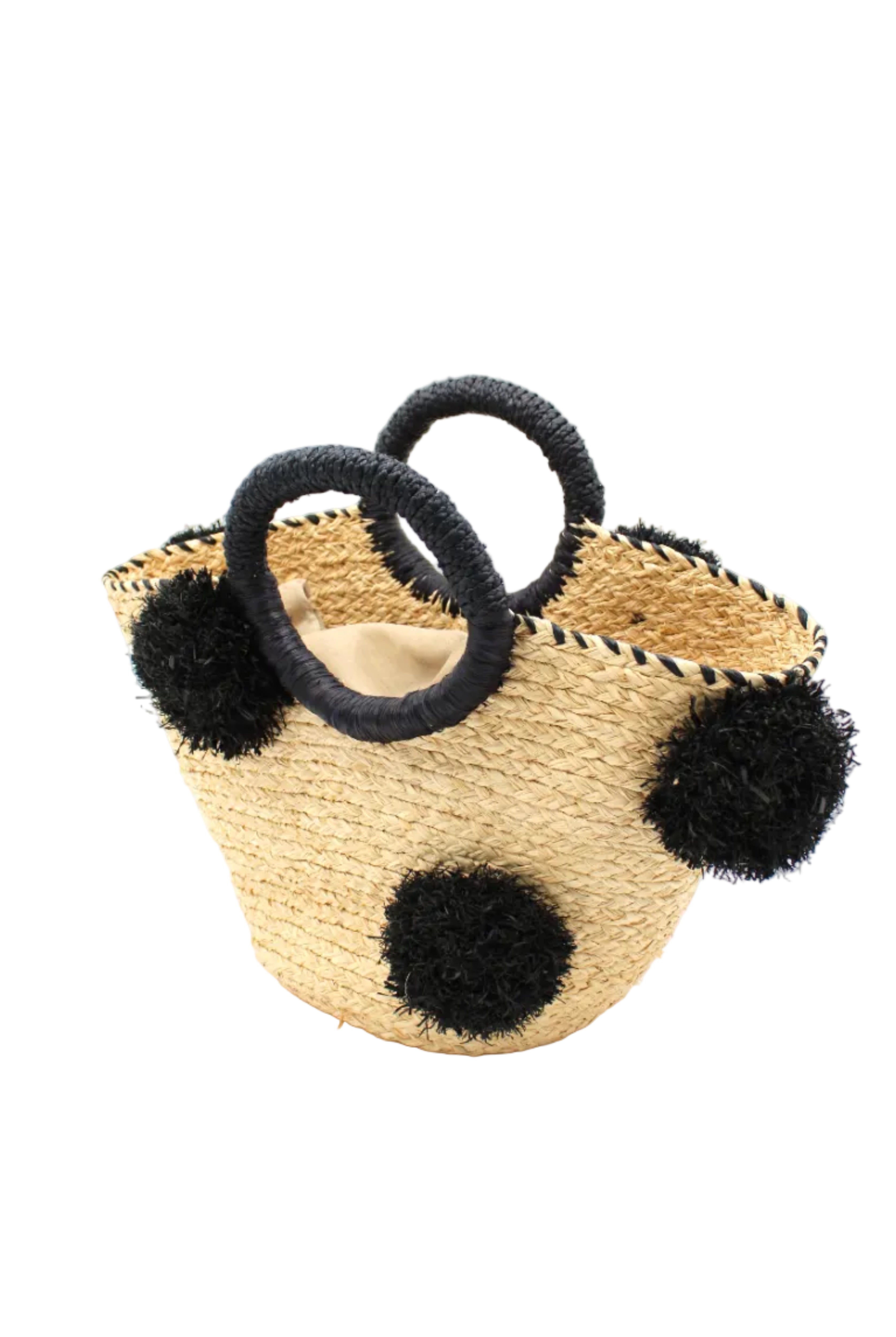 Side View Phi Phi Black and Natural Braided Straw Basket with Oversized Raffia Poufs handmade raffia palm fiber braided into a solid hue of natural straw color with three randomly placed black hand-brushed fringe poufs per side for embellishment with matching loop wrap top edging and matching crochet loop/braided handles bag handbag - Shebobo