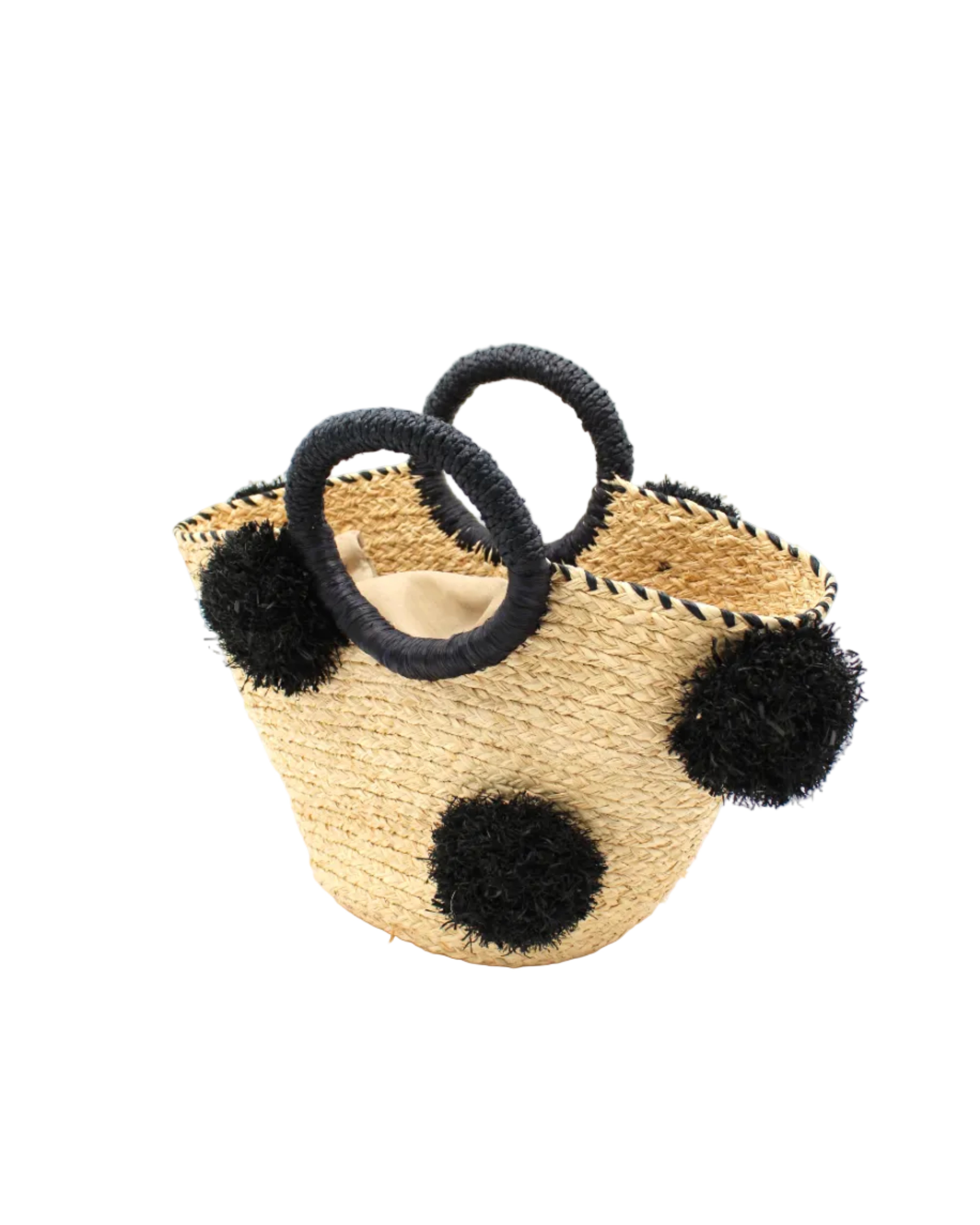 Side View Phi Phi Black and Natural Braided Straw Basket with Oversized Raffia Poufs handmade raffia palm fiber braided into a solid hue of natural straw color with three randomly placed black hand-brushed fringe poufs per side for embellishment with matching loop wrap top edging and matching crochet loop/braided handles bag handbag - Shebobo