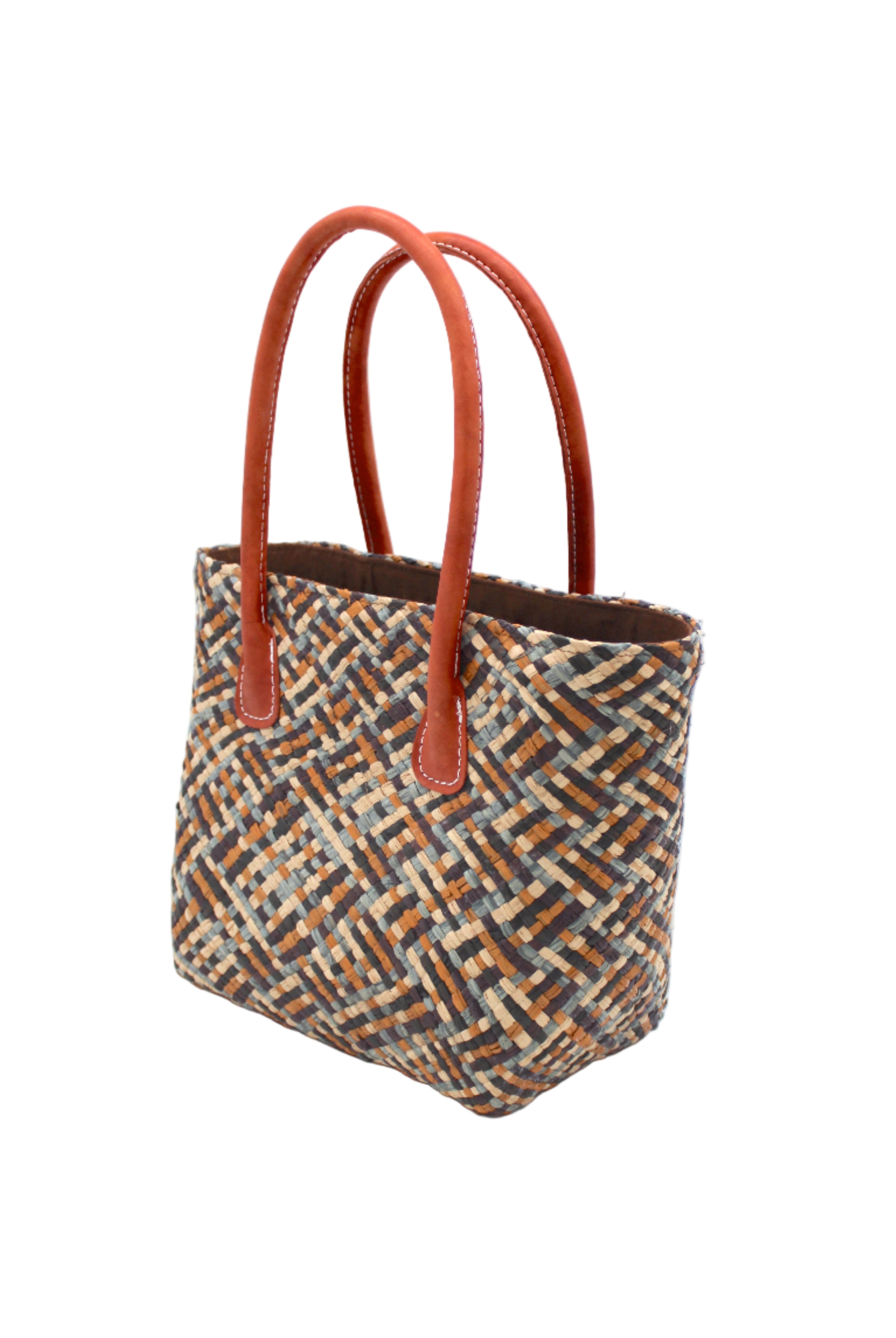 Side view Pianina Zaphyr Multi Small Straw Basket Bag handmade from woven natural raffia palm fiber in a multicolor cross weave pattern of dark purple/grey/brown, olive green, denim light/blue, and natural straw color handbag purse with leather handles - Shebobo