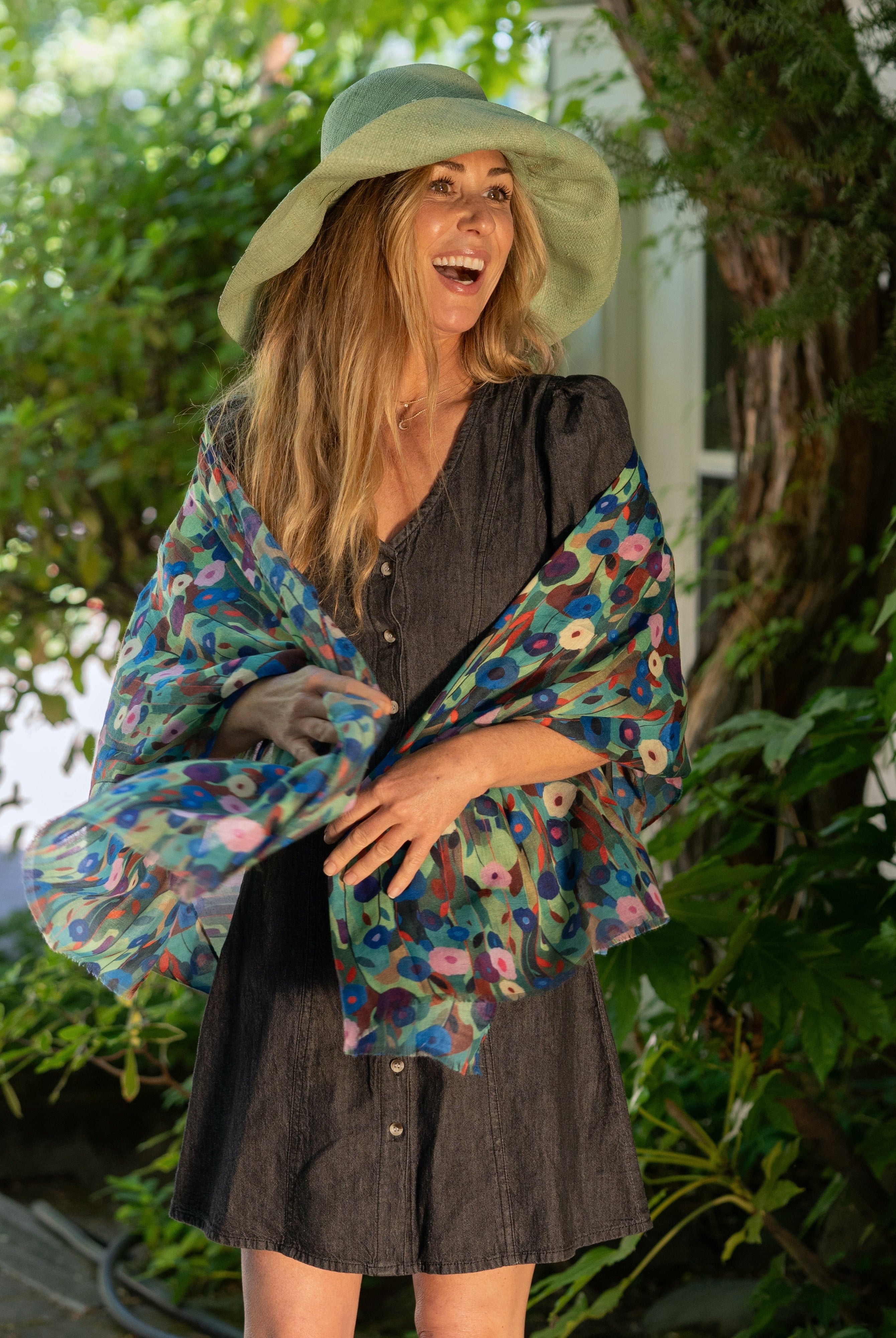 Model wearing Poppy Dreams Scarf Wrap Green with multicolored floral patterned scarf - Shebobo (with Monica 5" & 7" Wide Brim Solid Color Packable Straw Sun Hats)