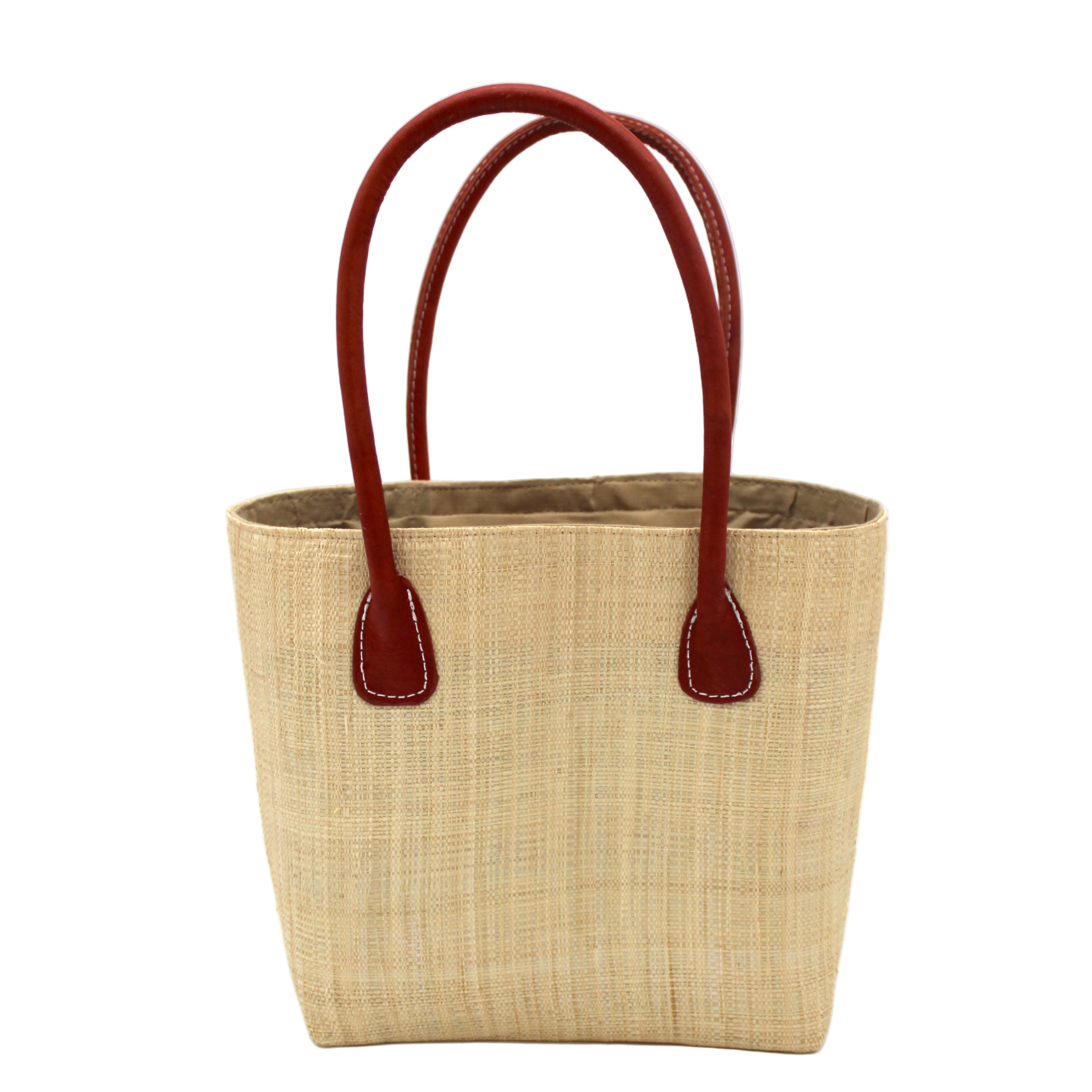 Raja Small Straw Basket Bag Natural handmade loomed raffia palm fiber in a solid hue of natural straw color large tote bag with leather handles handbag top handle beach bag - Shebobo