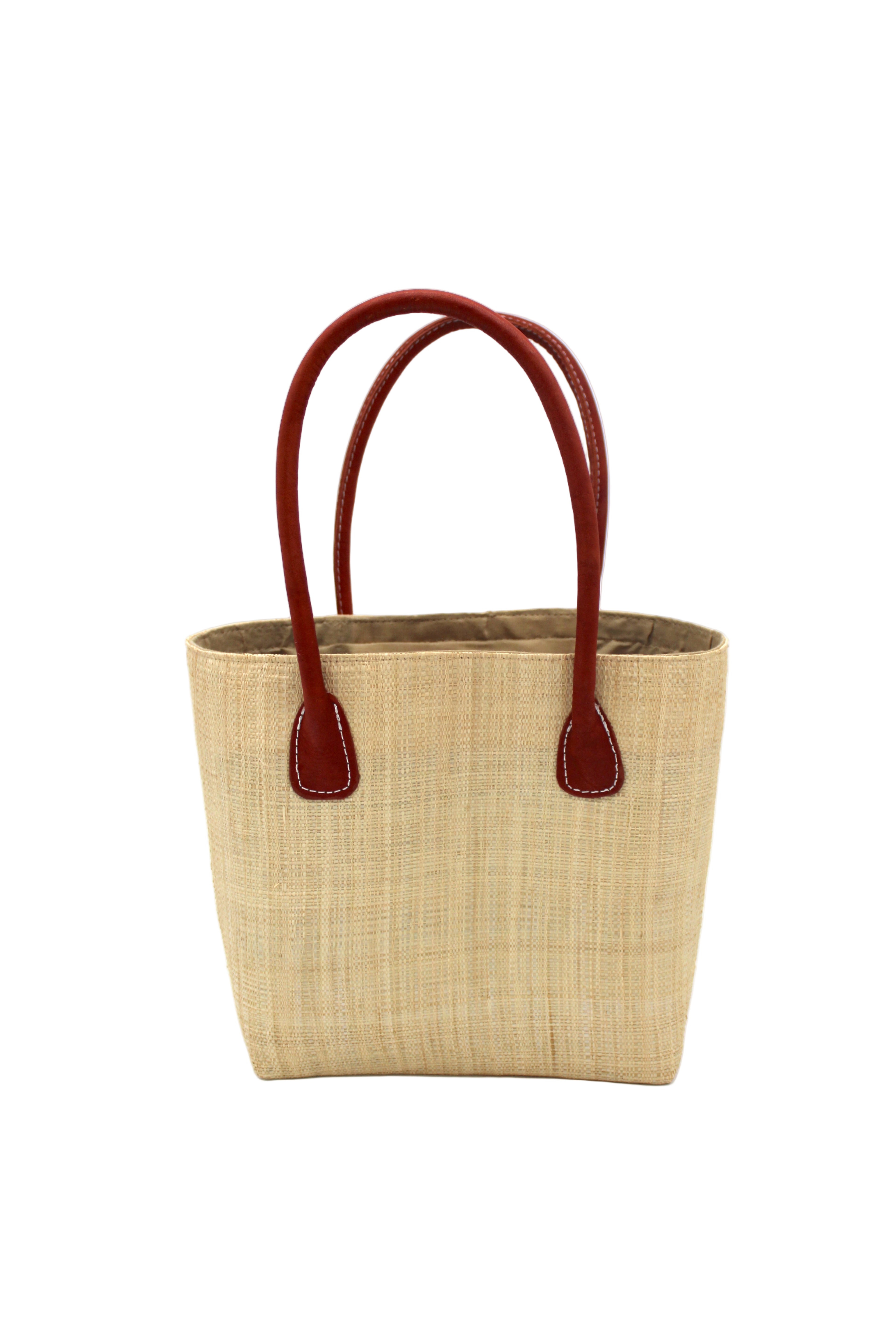 Raja Small Straw Basket Bag Natural handmade loomed raffia palm fiber in a solid hue of natural straw color large tote bag with leather handles handbag top handle beach bag - Shebobo