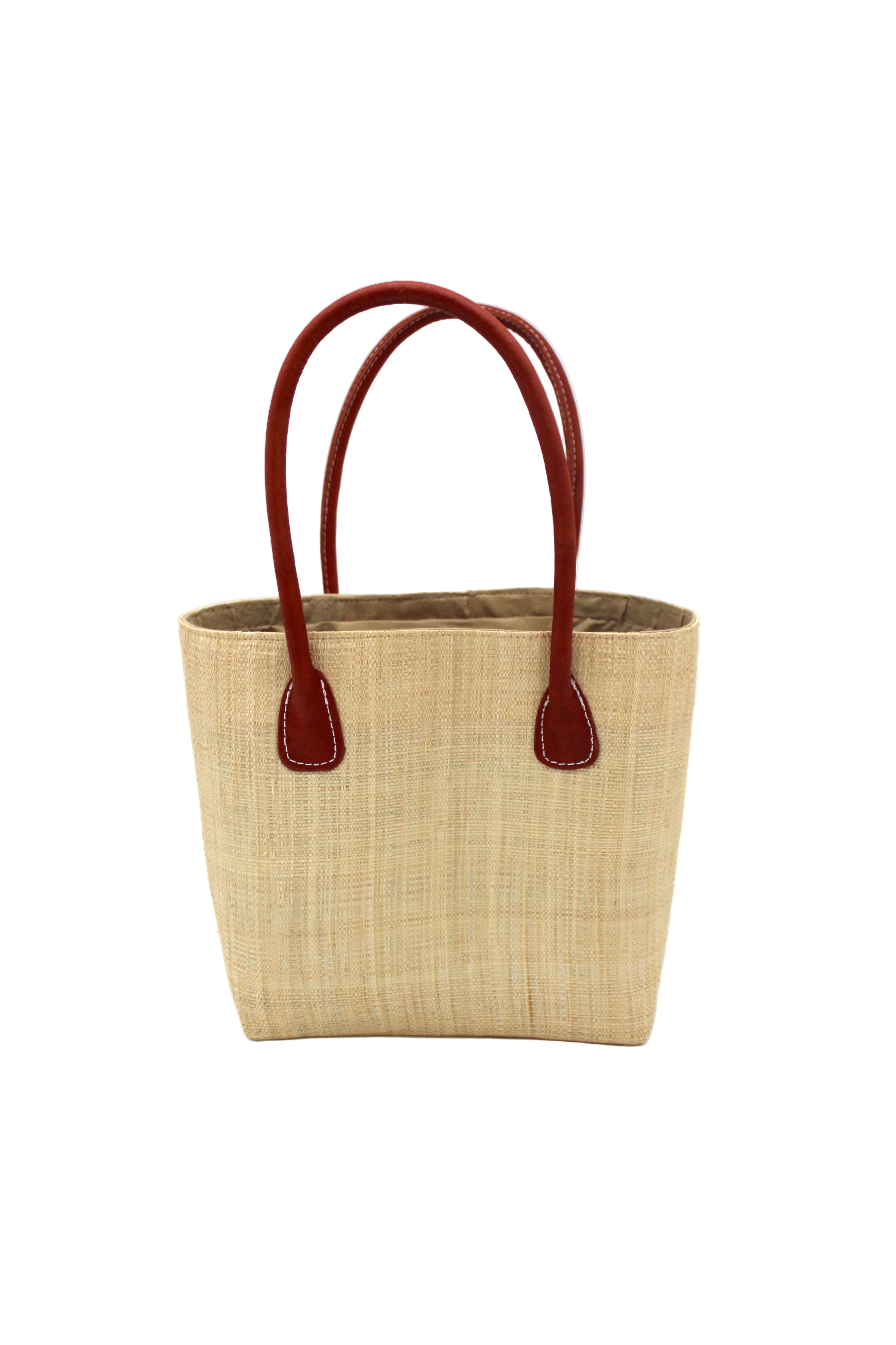 Raja Small Straw Basket Bag Natural handmade loomed raffia palm fiber in a solid hue of natural straw color large tote bag with leather handles handbag top handle beach bag - Shebobo
