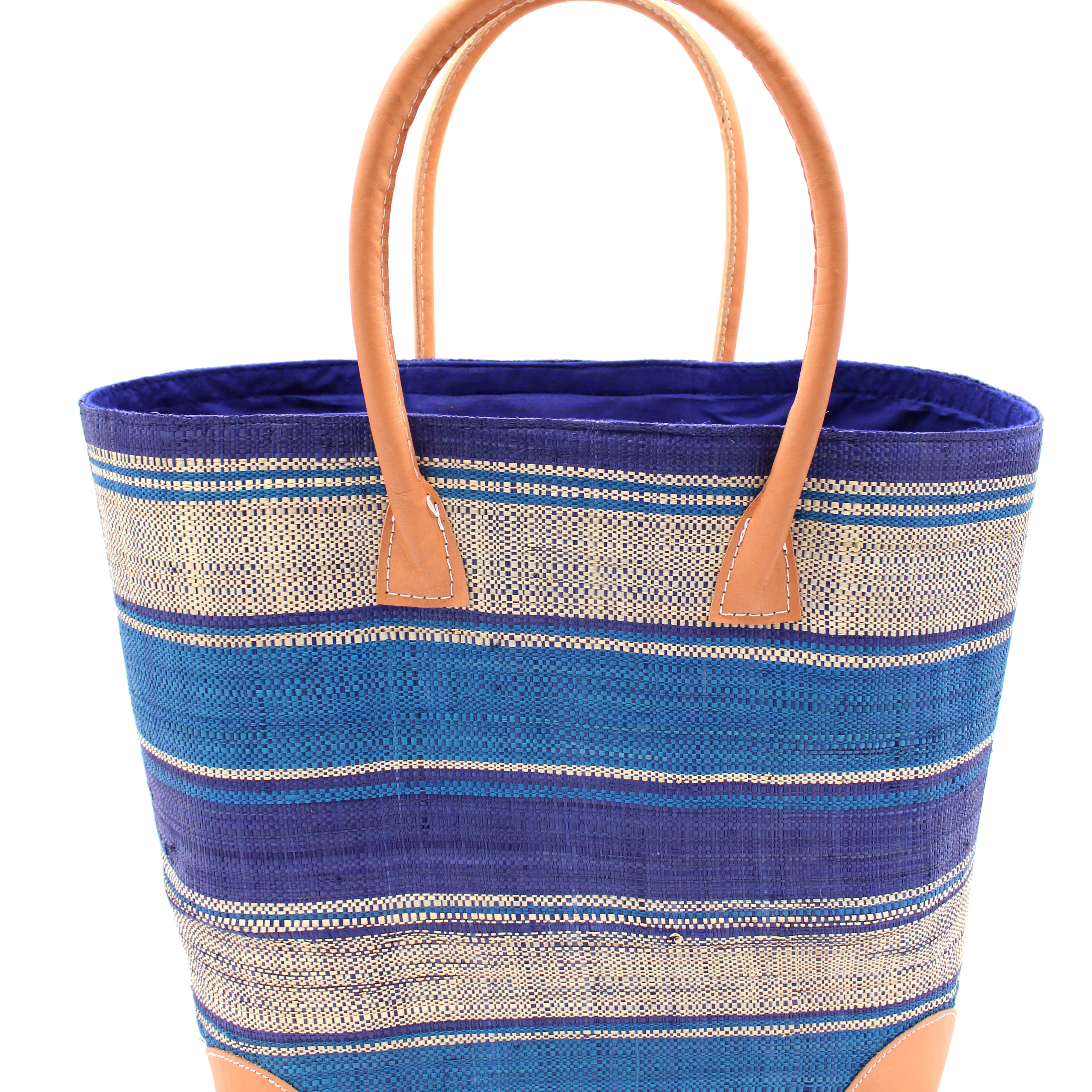 Rayo Stripes Straw Basket Bag Blue Swirl Multicolor navy blue, turquoise blue and natural straw color multiple width horizontal stripe pattern handmade loomed natural raffia palm fiber tote beach bag - Shebobo