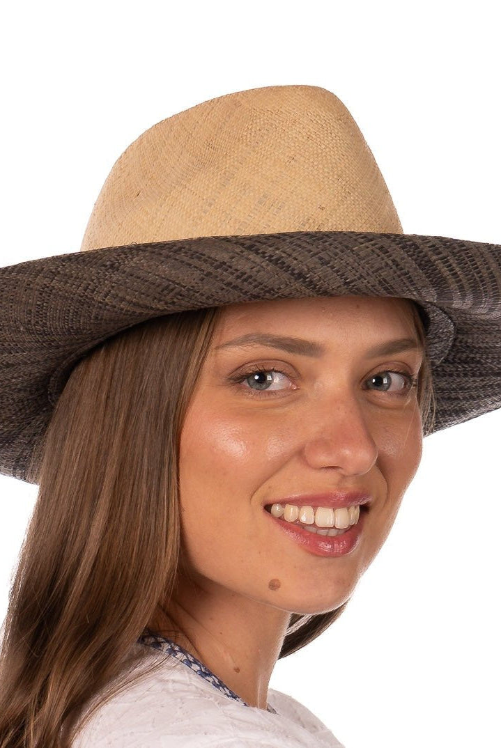 Model wearing Riley 3" Brim Panama Unisex Two Tone Straw Hats handmade loomed raffia palm fiber in a solid hue of natural straw color on the crown and solid grey on the brim with matching attached hat band lightweight breathable uv/sun protection straw sun hat - Shebobo
