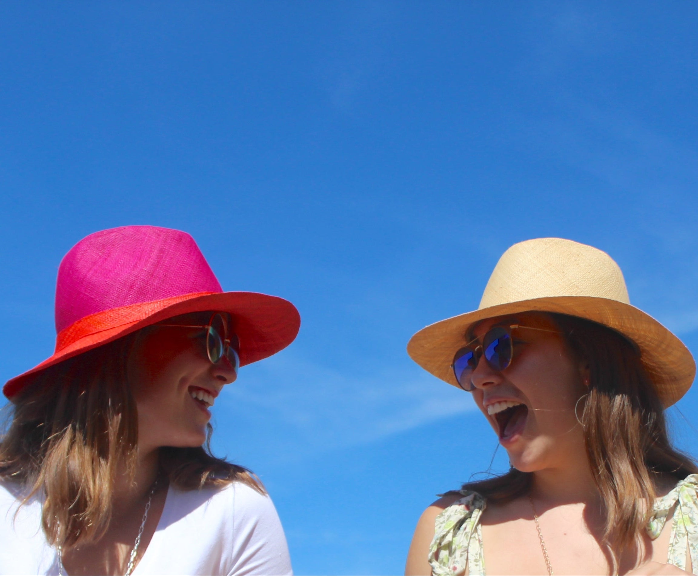 Model wearing Riley 3" Brim Panama Unisex Two Tone Straw Hats handmade loomed raffia palm fiber in a solid hue of fuchsia hot/bright/barbie/pink on the crown and solid coral orange/red on the brim with matching attached hat band lightweight breathable uv/sun protection straw sun hat - Shebobo (with Panama Natural Straw Hat)