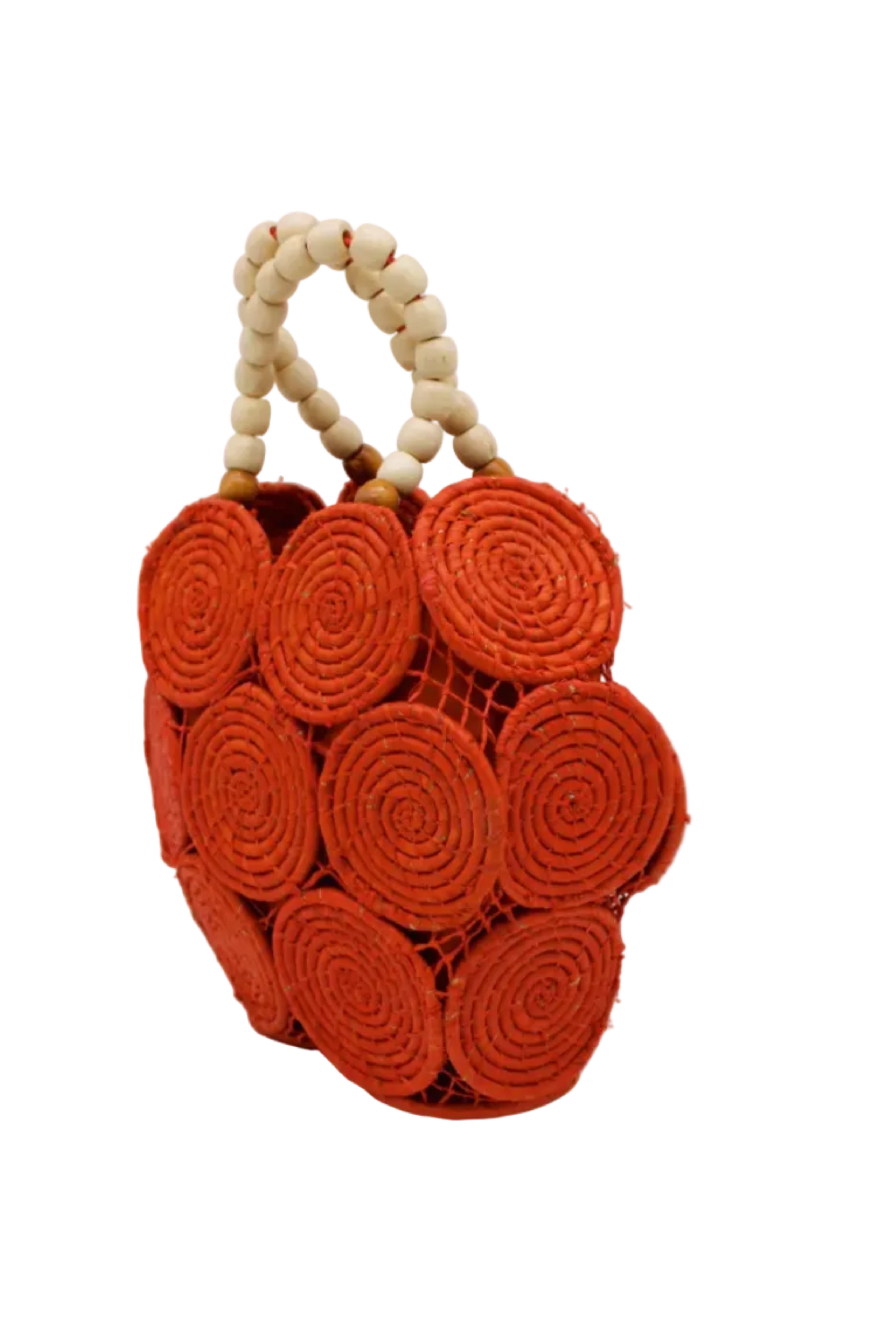 Side view Romy Coral Crochet Disc Straw Handbag with Wooden Bead Handles handmade natural raffia palm fiber in a solid hue of coral orange/red in a crochet coiled circular flat disc attached together with macrame knot technique with a geometric hexagonal overall shape with seven discs per side two above and below a horizontal row of three per side and a single row comprising the side of the bag with beige carved round wooden beaded handles purse - Shebobo