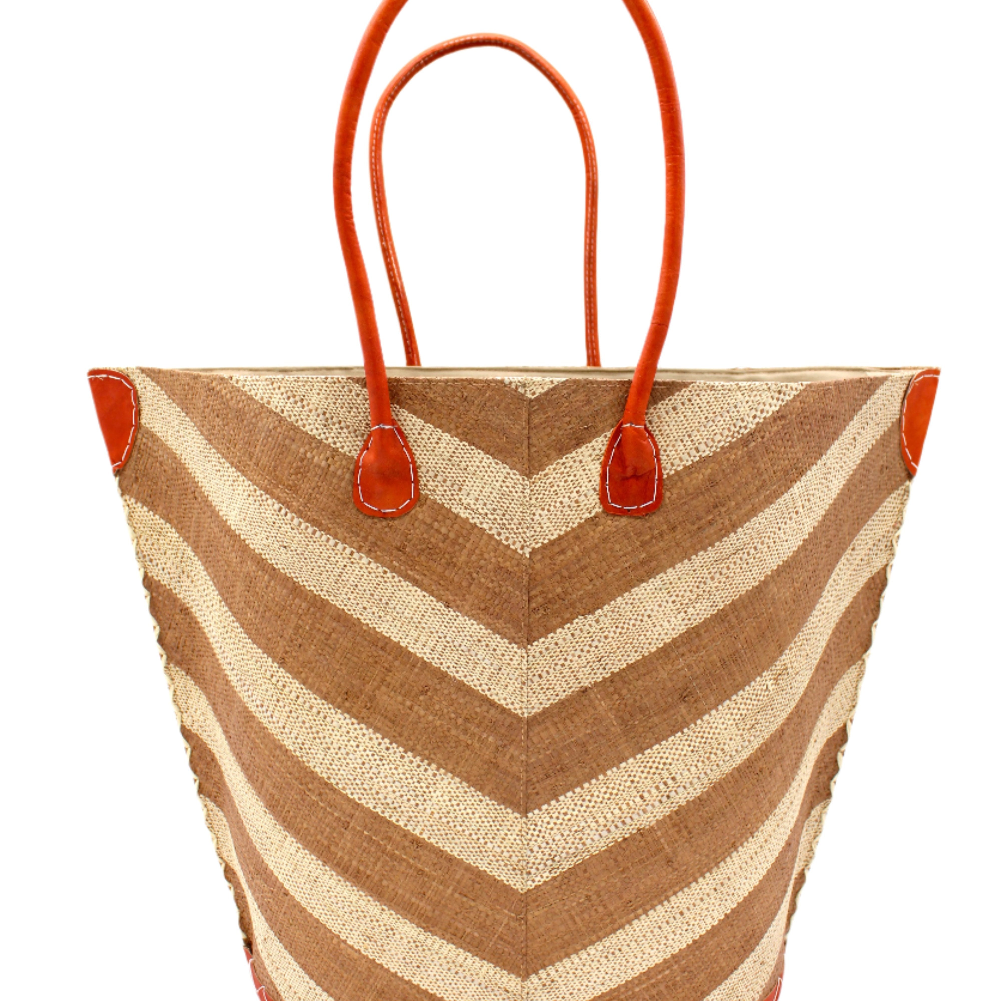 Santa Cruz Wide Stripe Chevron Large Straw Tote Bag handmade loomed raffia palm fiber in a two tone diagonal even width bands of color in a wide stripe chevron pattern of cappuccino/light brown/beige and natural straw color on the front and a matching solid hue on the back with leather accents and handles large shoulder bag - Shebobo