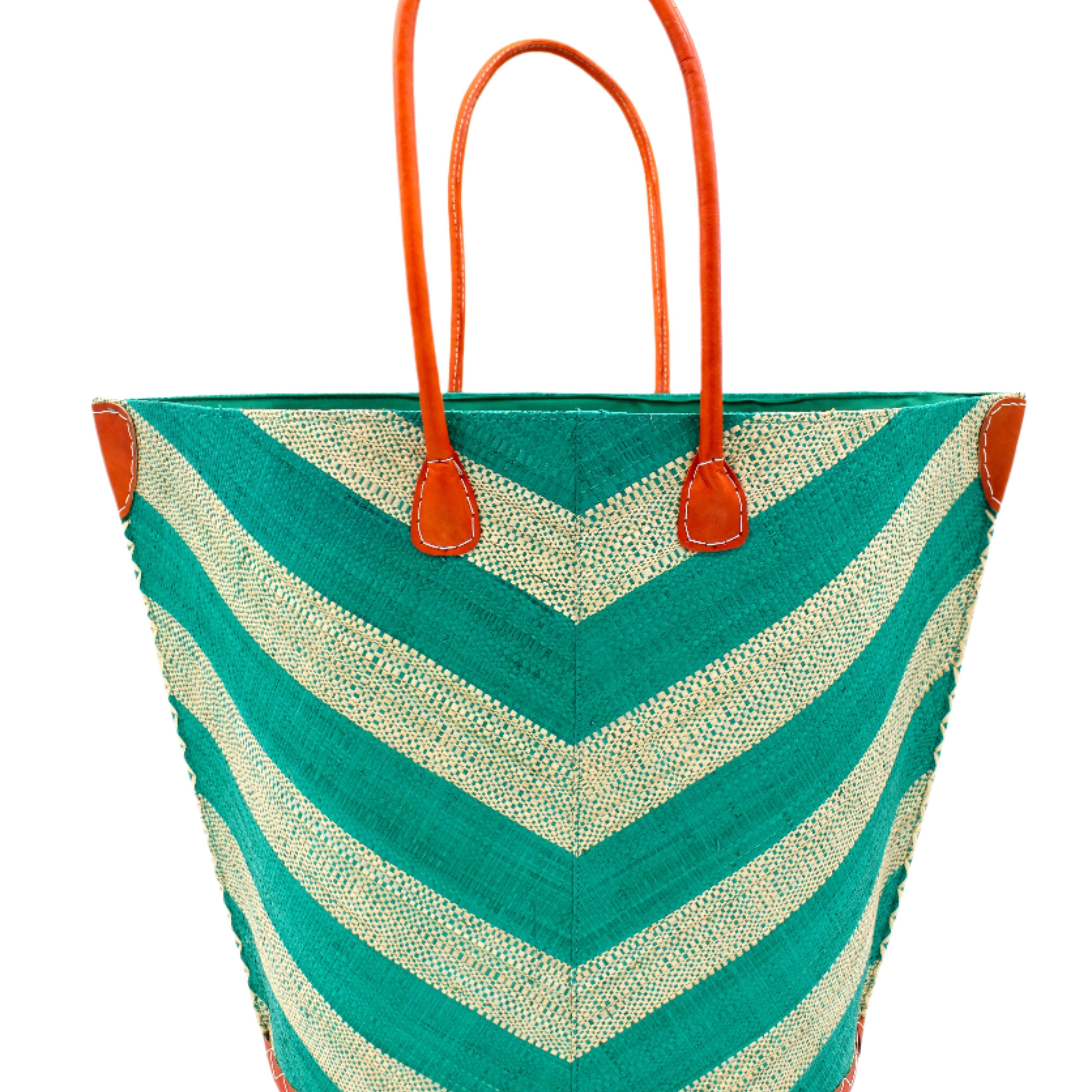 Santa Cruz Wide Stripe Chevron Large Straw Tote Bag handmade loomed raffia palm fiber in a two tone diagonal even width bands of color in a wide stripe chevron pattern of teal green/blue and natural straw color on the front and a matching solid hue on the back with leather accents and handles large shoulder bag - Shebobo