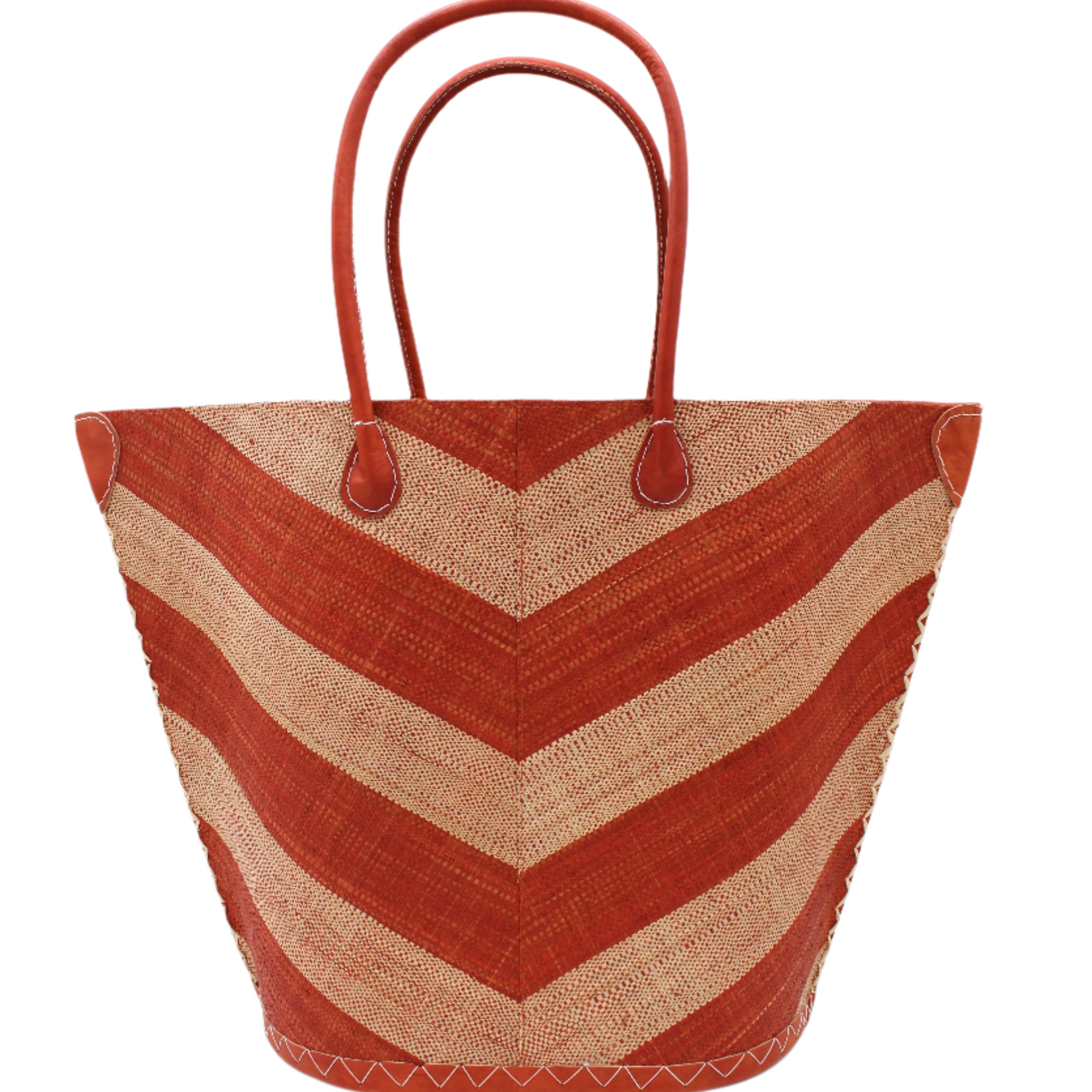 Santa Cruz Wide Stripe Chevron Large Straw Tote Bag handmade loomed raffia palm fiber in a two tone diagonal even width bands of color in a wide stripe chevron pattern of whisky carmel/orange/brown and natural straw color on the front and a matching solid hue on the back with leather accents and handles large shoulder bag - Shebobo