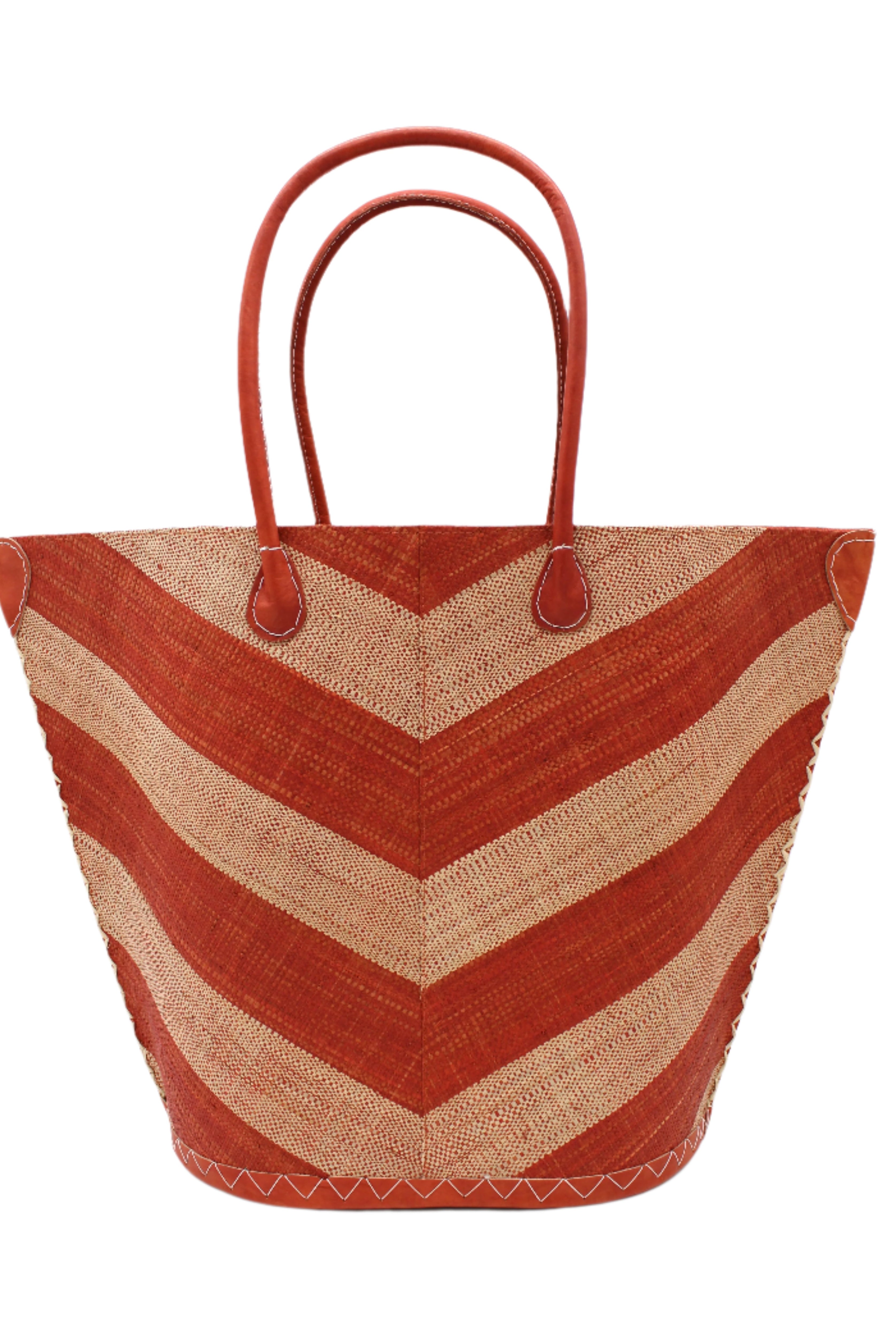 Santa Cruz Wide Stripe Chevron Large Straw Tote Bag handmade loomed raffia palm fiber in a two tone diagonal even width bands of color in a wide stripe chevron pattern of whisky carmel/orange/brown and natural straw color on the front and a matching solid hue on the back with leather accents and handles large shoulder bag - Shebobo