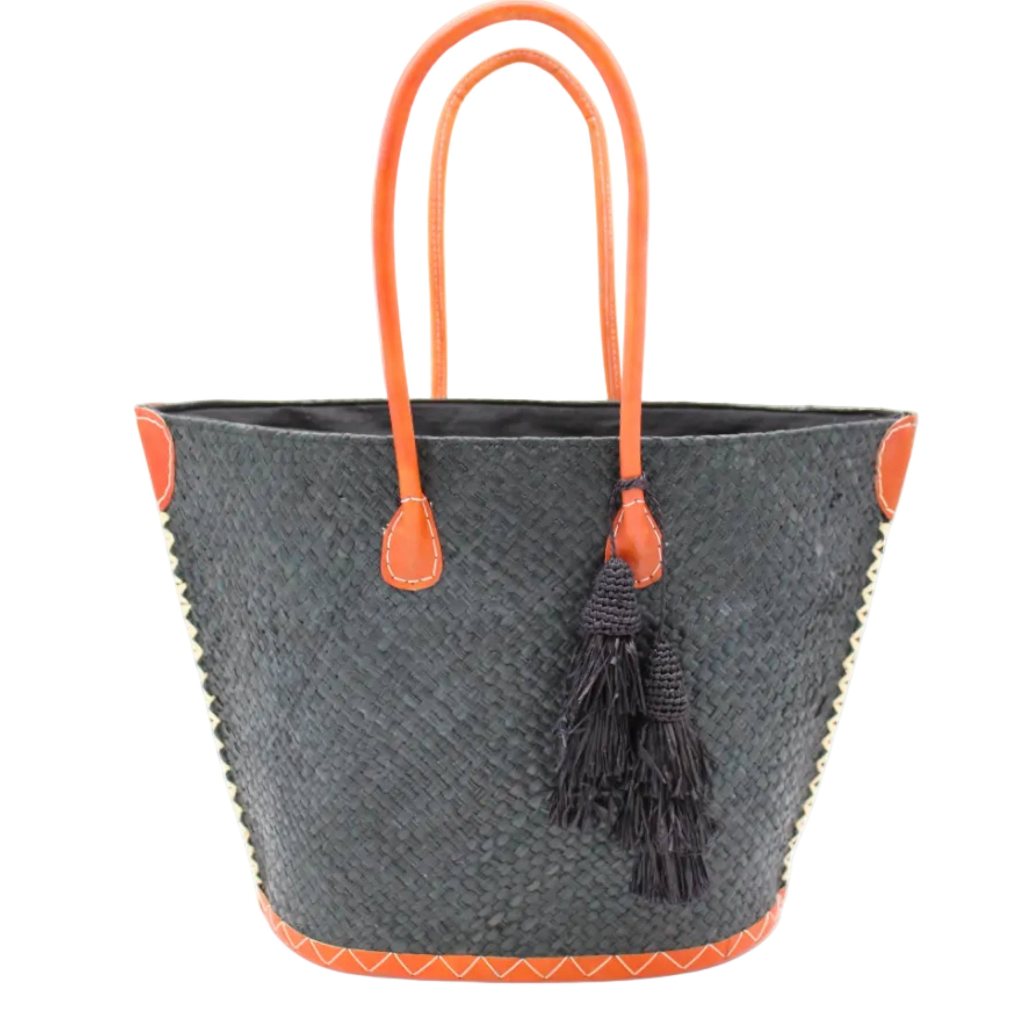 Santa Ynez Woven Small Straw Tote Bag with Tassel Charm Embellishment handmade woven raffia palm fiber in a solid hue of black with matching tassel tie charm embellishment and leather handles beach bag - Shebobo