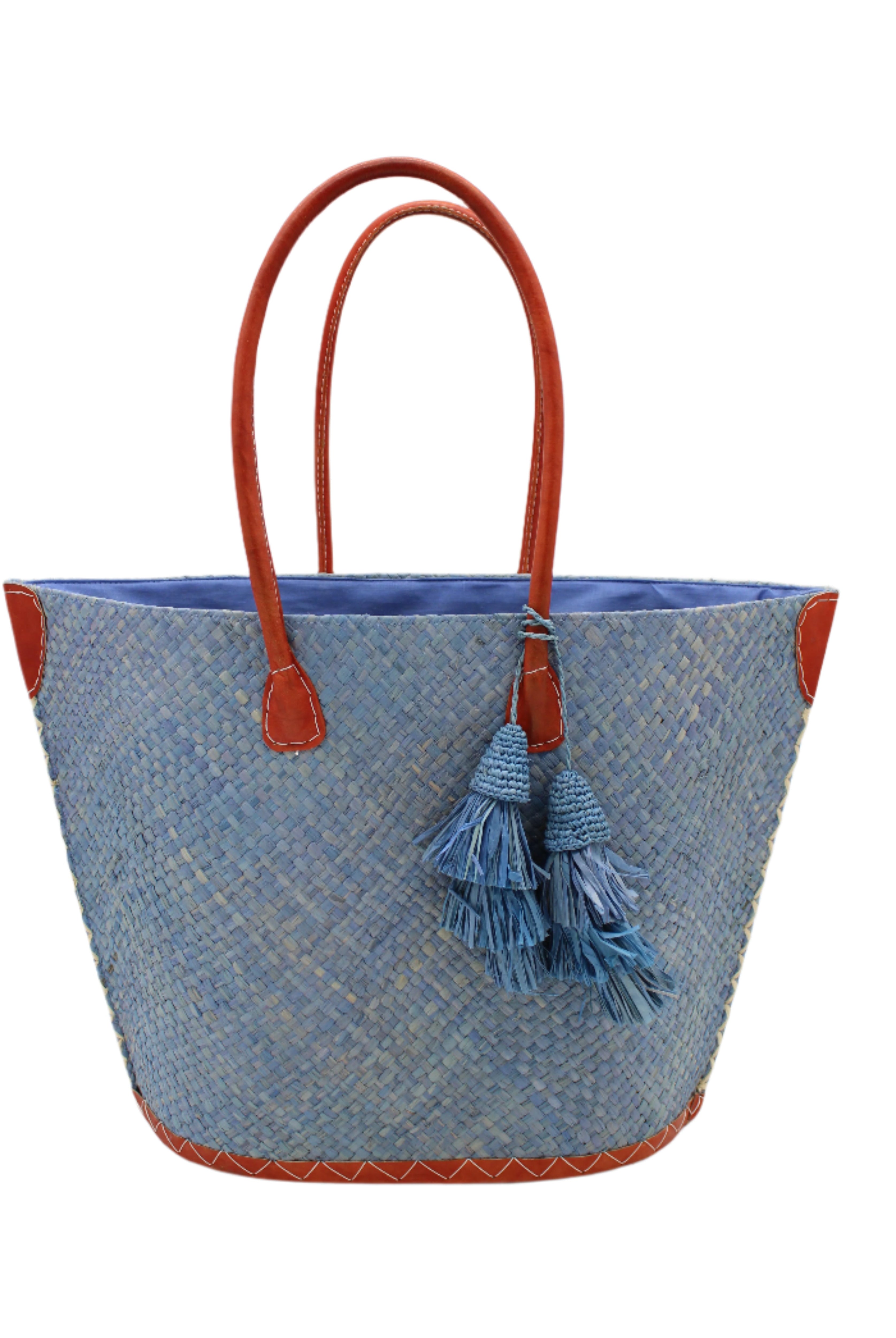 Santa Ynez Woven Small Straw Tote Bag with Tassel Charm Embellishment handmade woven raffia palm fiber in a solid hue of denim retro/light/blue with matching tassel tie charm embellishment and leather handles beach bag - Shebobo