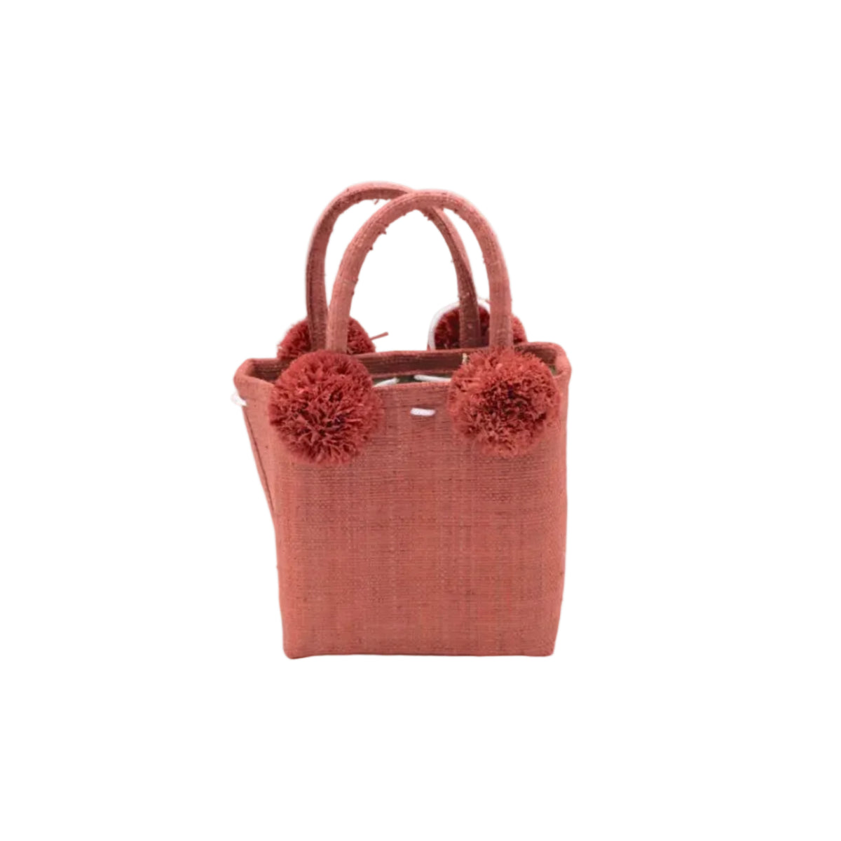 Schooner Straw Mini Bag with Pompom Accent handmade loomed natural raffia palm fiber in a solid hue of Blush orange/pink with four matching raffia pompom embellishments at the base of each handle attachment tiny purse extra small handbag - Shebobo