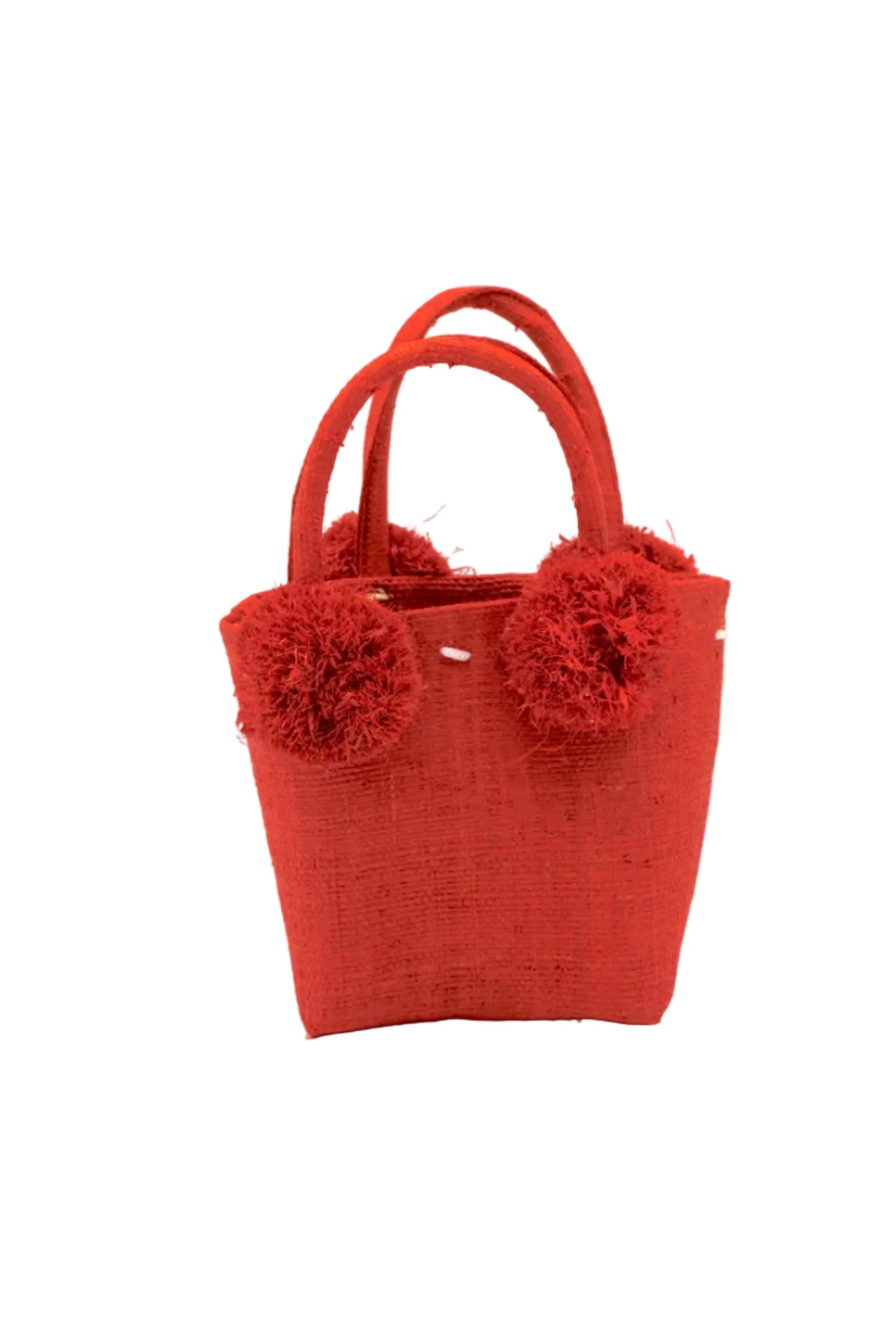 Schooner Straw Mini Bag with Pompom Accent handmade loomed natural raffia palm fiber in a solid hue of Coral orange/red with four matching raffia pompom embellishments at the base of each handle attachment tiny purse extra small handbag - Shebobo
