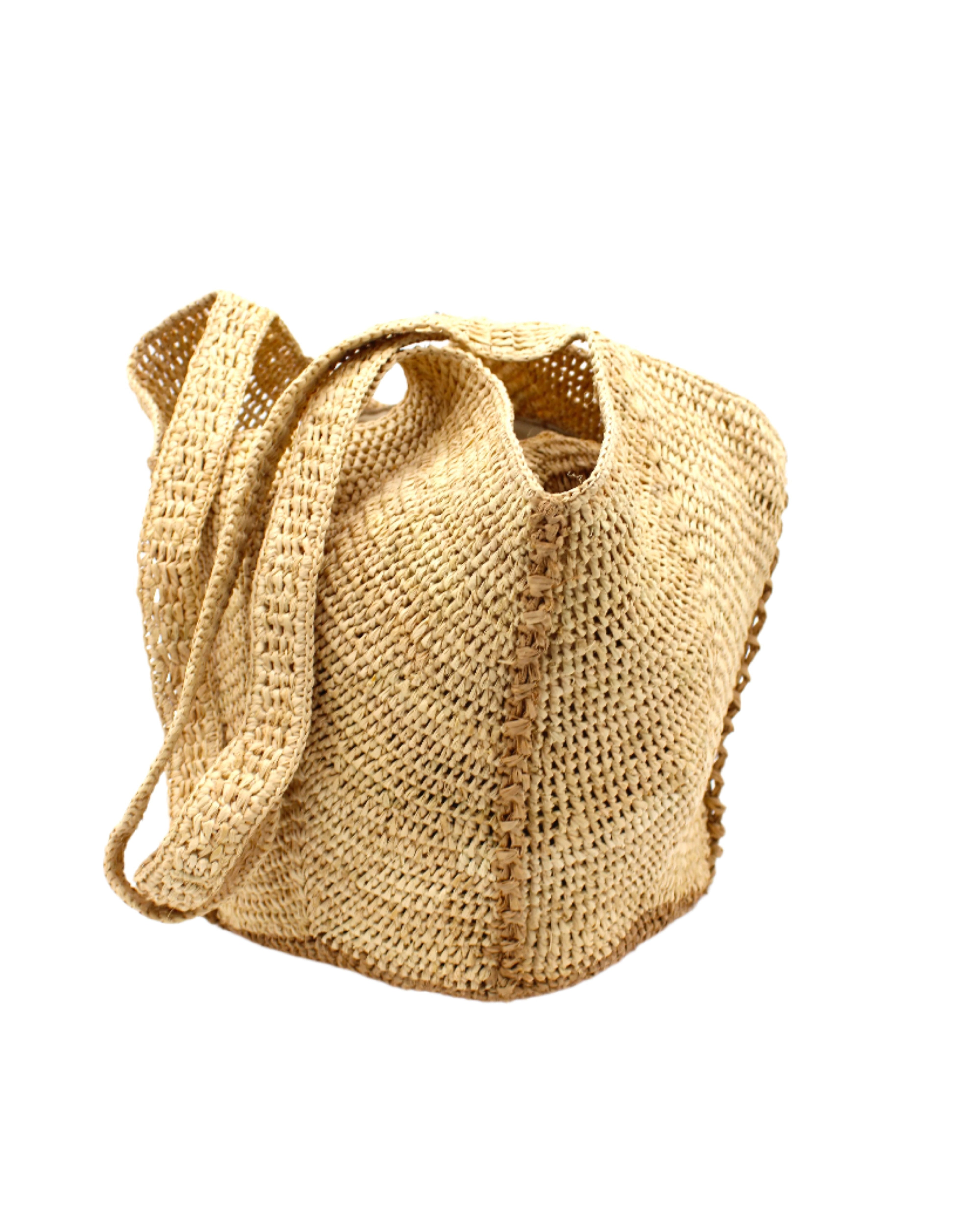 Sea See Cappuccino Straw Shoulder Bag handmade woven raffia palm fiber in a solid hue of natural straw color making a diagonal link pattern with cappuccino light/brown/beige crochet circular bottom and vertical edging along the side panels creating a two tone multicolor handbag/beach bag/purse - Shebobo