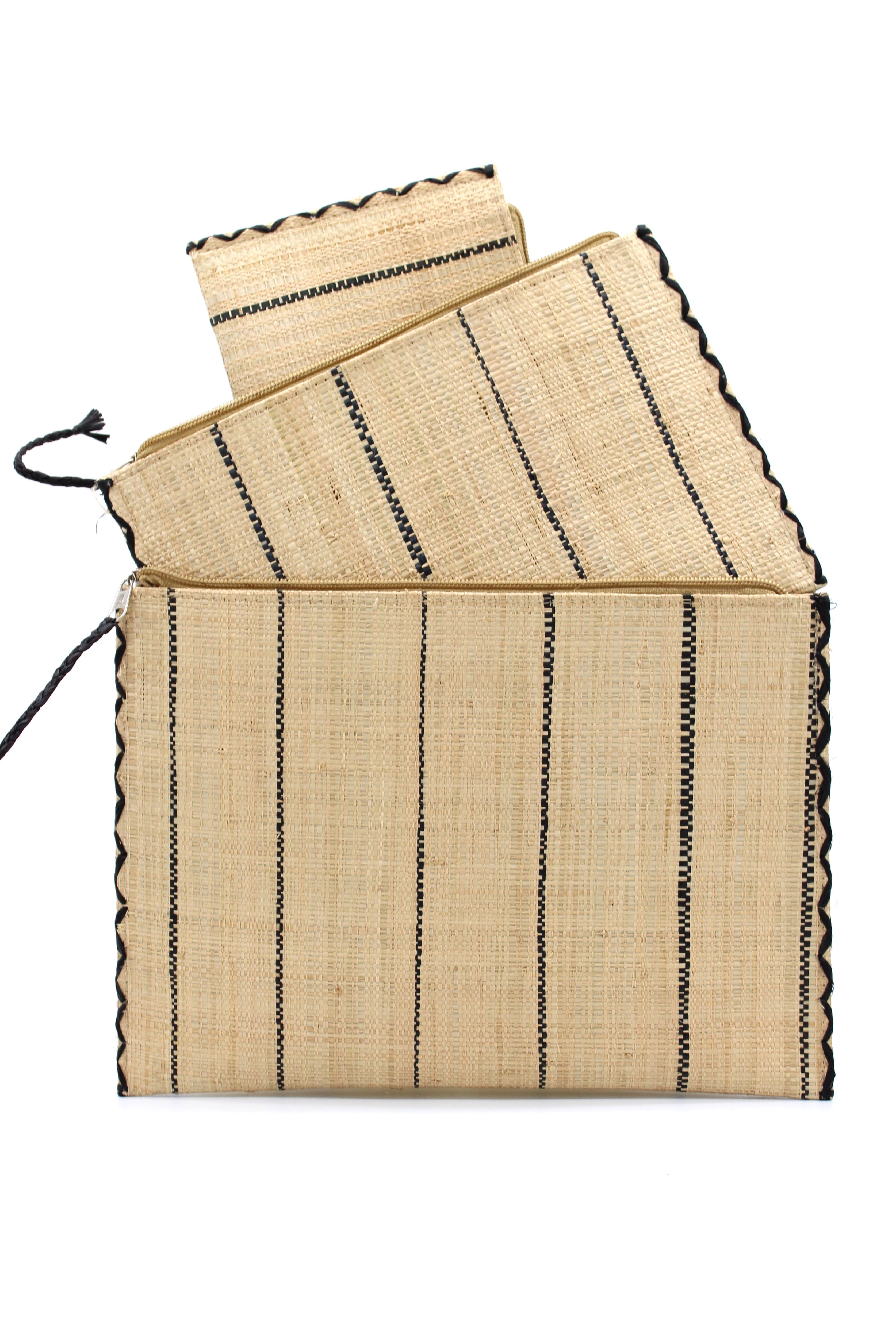 Set of 3 Natural Nesting Zippered Straw Clutches Pinstripe Pattern handmade loomed raffia in wide vertical bands of natural straw color with narrow bands of black with matching zipper and braided zipper pull with cross stitch edging in three sizes of small, medium, and large - Shebobo