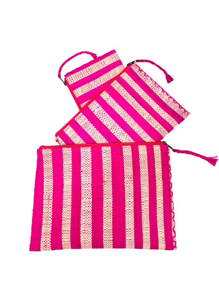 Set of 3 Nesting Zippered Straw Clutches Fuchsia Multicolor Stripe Pattern handmade loomed raffia in vertical stripes of fuchsia pink and natural straw color with matching zipper and braided zipper pull with cross stitch edging in three sizes of small, medium, and large - Shebobo