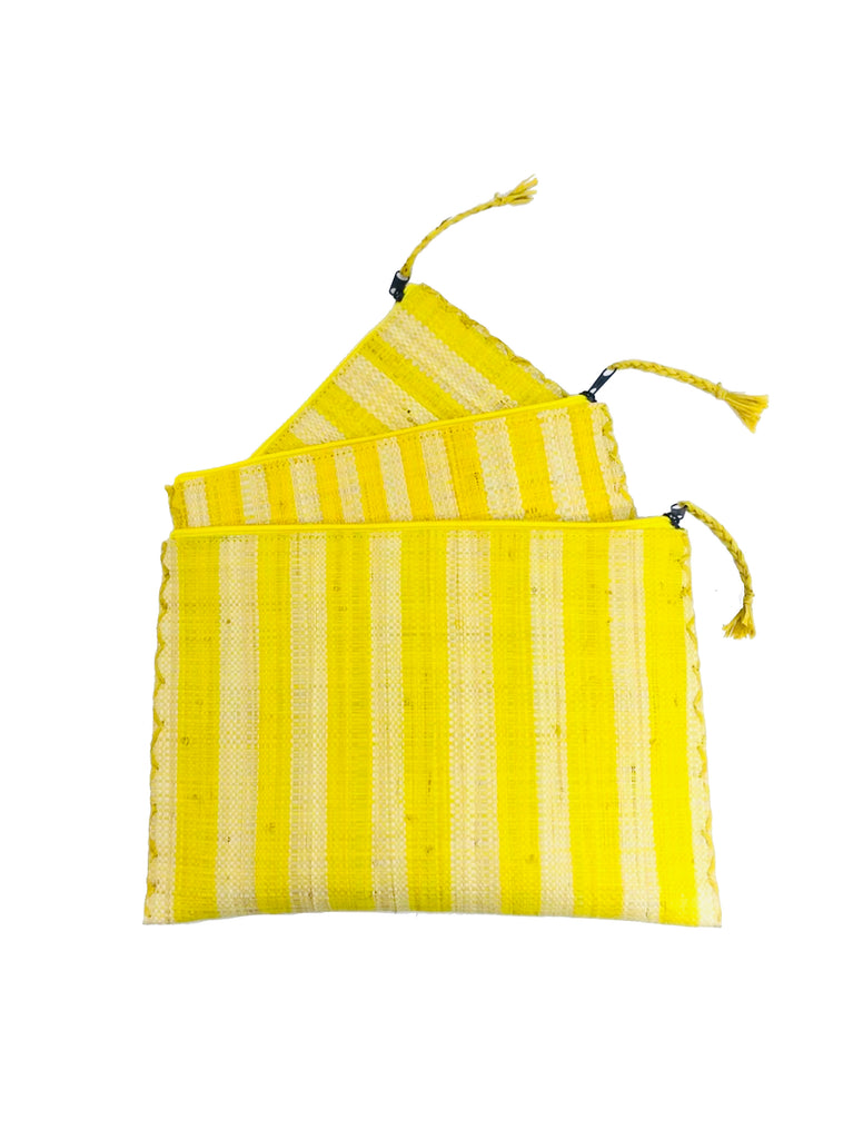 Set of 3 Nesting Zippered Straw Clutches Yellow Multicolor Stripe Pattern handmade loomed raffia in vertical stripes of bright yellow and natural straw color with matching zipper and braided zipper pull with cross stitch edging in three sizes of small, medium, and large - Shebobo