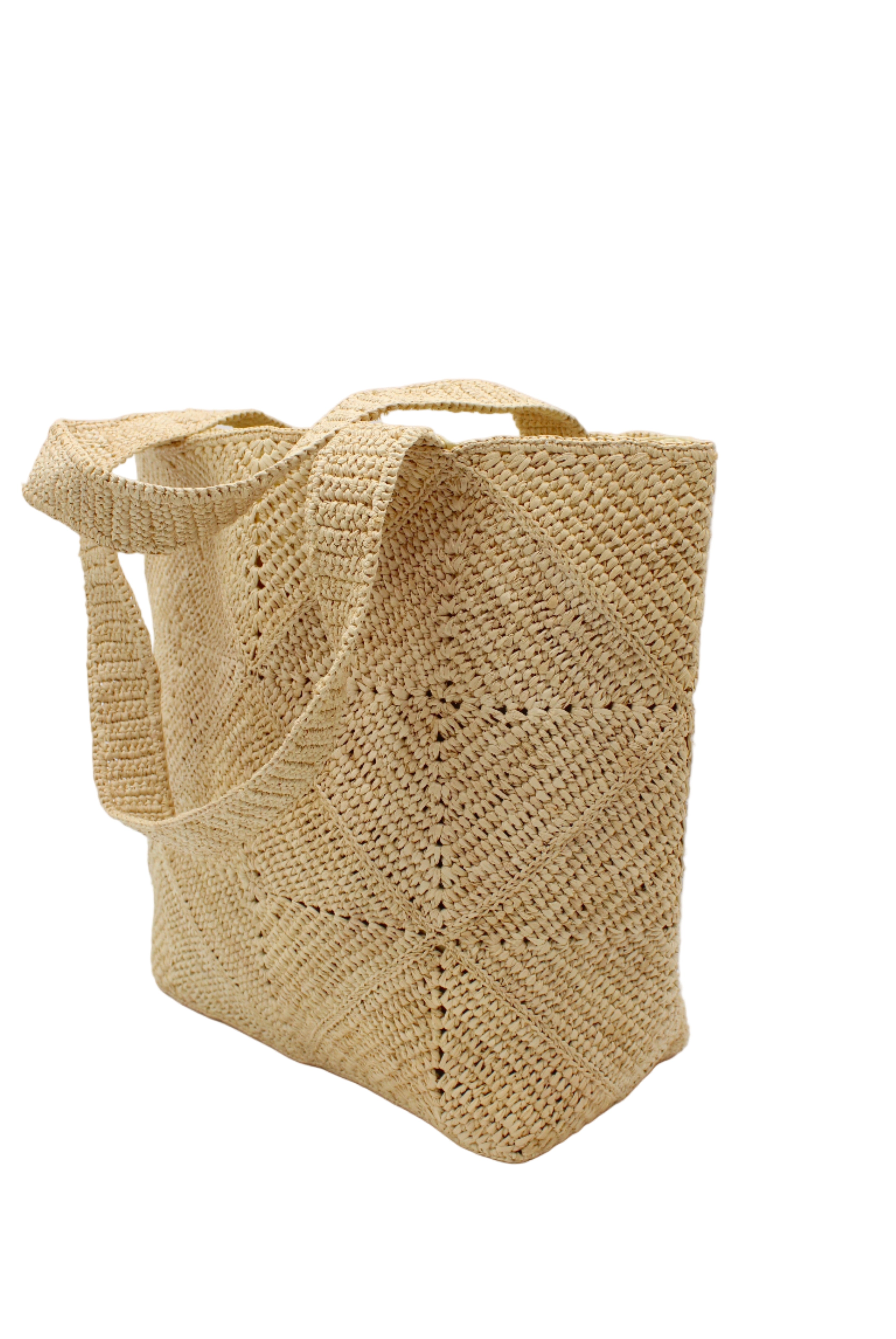 Side view Seychelle Natural Diamond Pattern Crochet Straw Basket Handbag handmade natural raffia palm fiber in a solid hue of natural straw color with subtle geometric diamond diagonal pattern with matching crochet handles beach bag tote purse - Shebobo