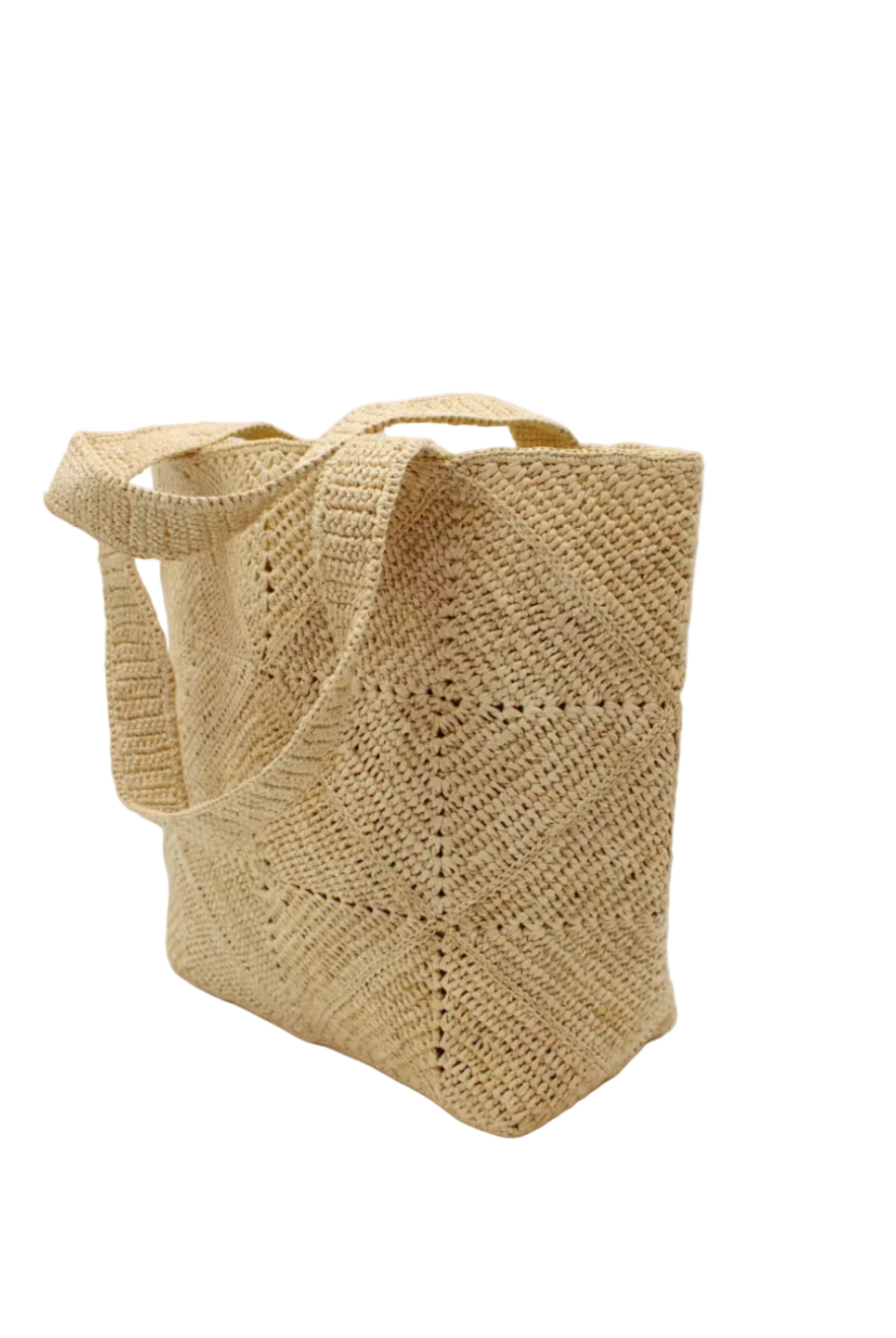 Side view Seychelle Natural Diamond Pattern Crochet Straw Basket Handbag handmade natural raffia palm fiber in a solid hue of natural straw color with subtle geometric diamond diagonal pattern with matching crochet handles beach bag tote purse - Shebobo