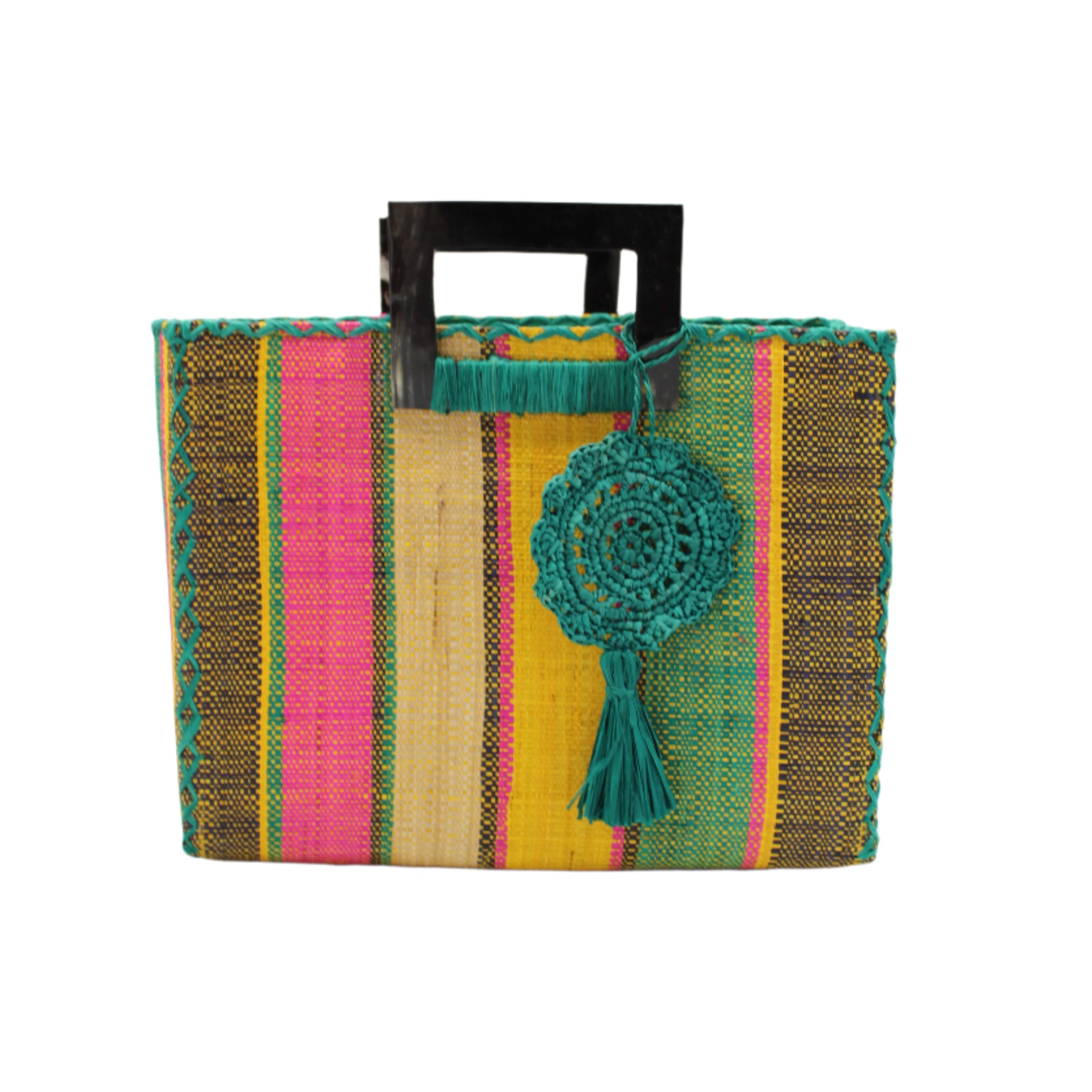 Stevie Square Carmalita Multicolor Stripe Straw Handbag with Horn Handles handmade loomed raffia with saffron yellow, turquoise blue, fuchsia pink, naural, and black varying width vertical stripe pattern purse with matching turquoise liner, cross stitch edging, handle attachment, and crochet doily tassel charm embellishment - Shebobo