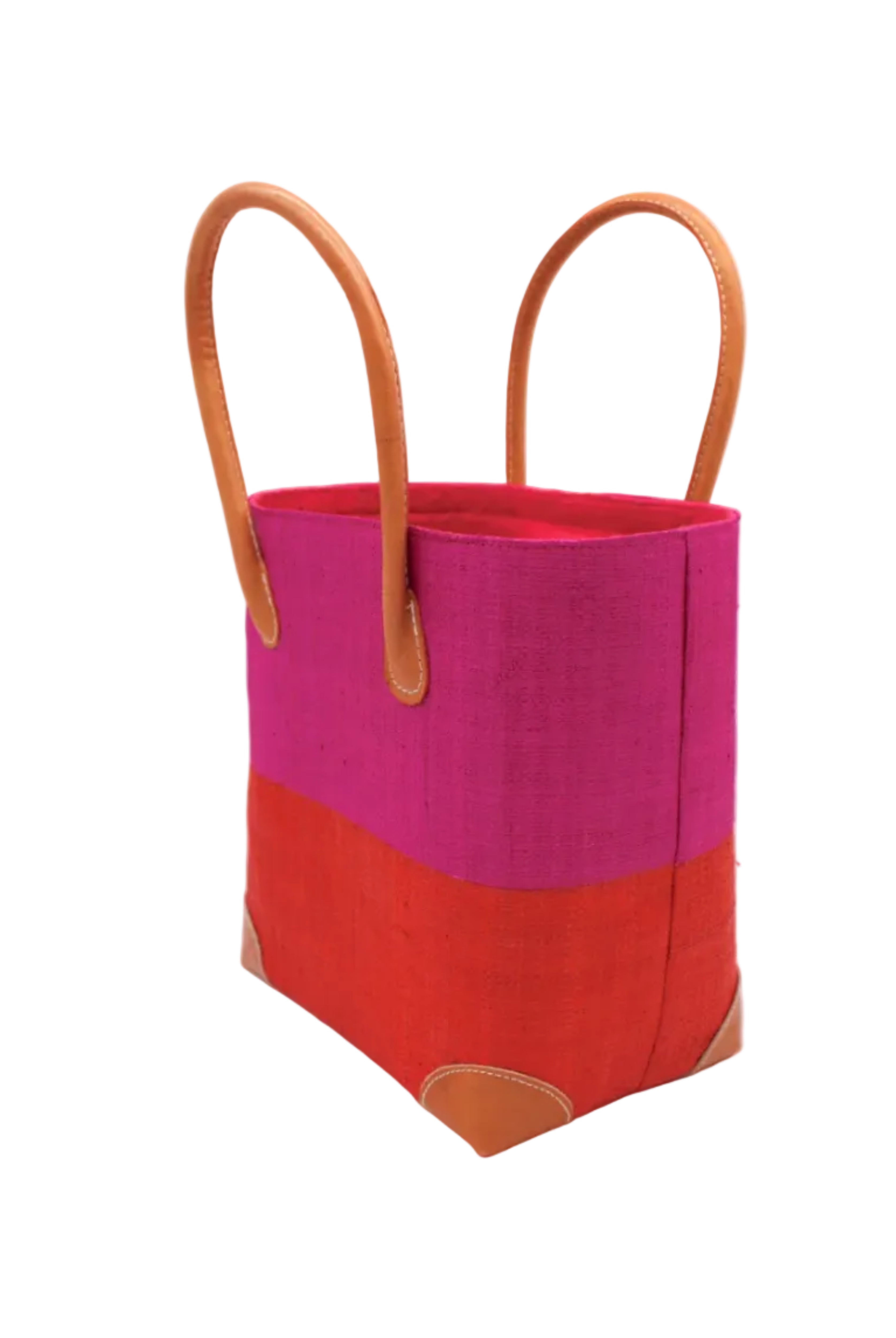 Side view Trinidad Fuchsia and Coral Two Tone Straw Basket Bag handmade loomed raffia palm fiber in a two tone color block pattern with coral orange/red on the bottom half and fuchsia hot/bright/barbie/pink on the top half of the bag with leather handles and accents beach bag tote purse - Shebobo