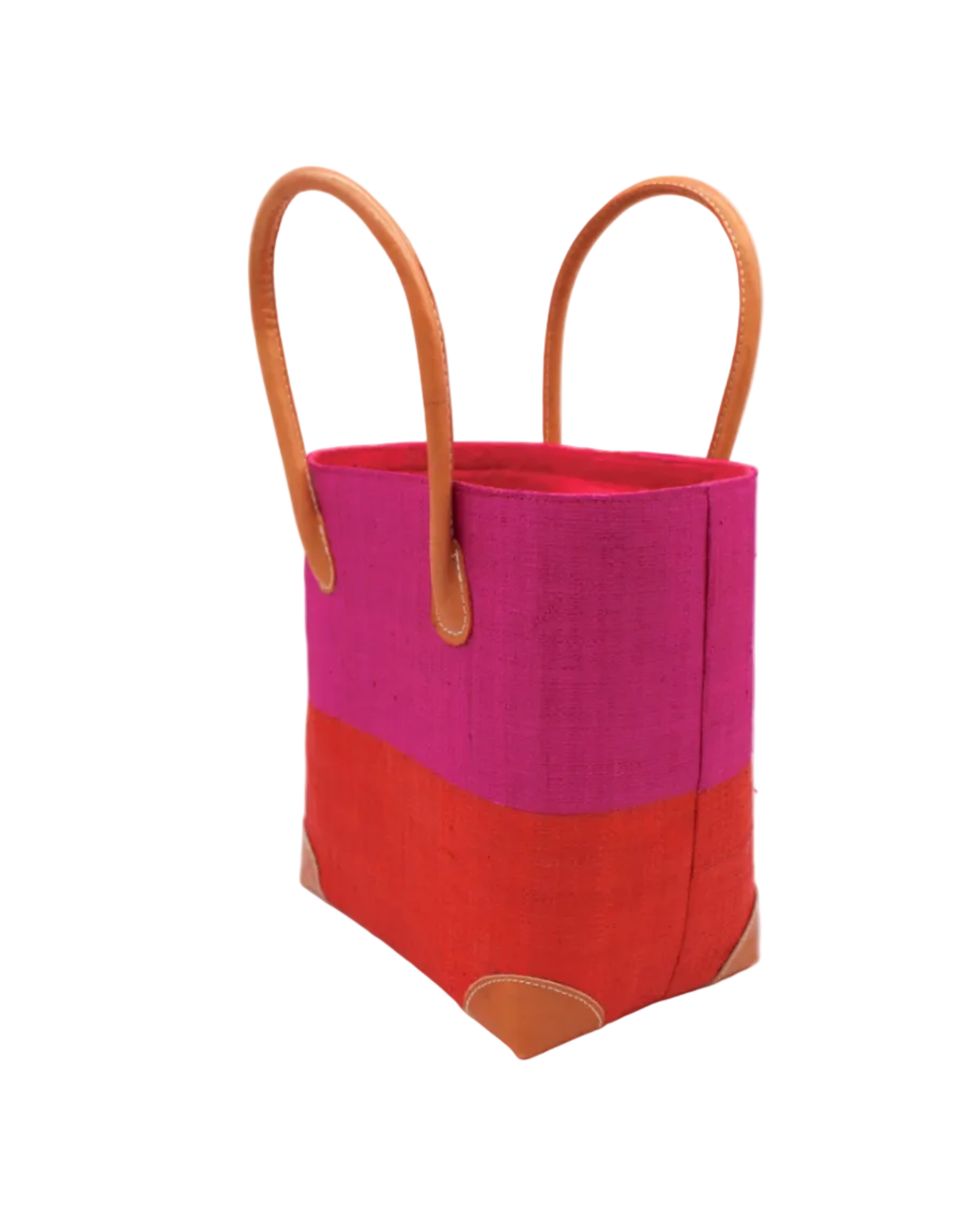 Side view Trinidad Fuchsia and Coral Two Tone Straw Basket Bag handmade loomed raffia palm fiber in a two tone color block pattern with coral orange/red on the bottom half and fuchsia hot/bright/barbie/pink on the top half of the bag with leather handles and accents beach bag tote purse - Shebobo