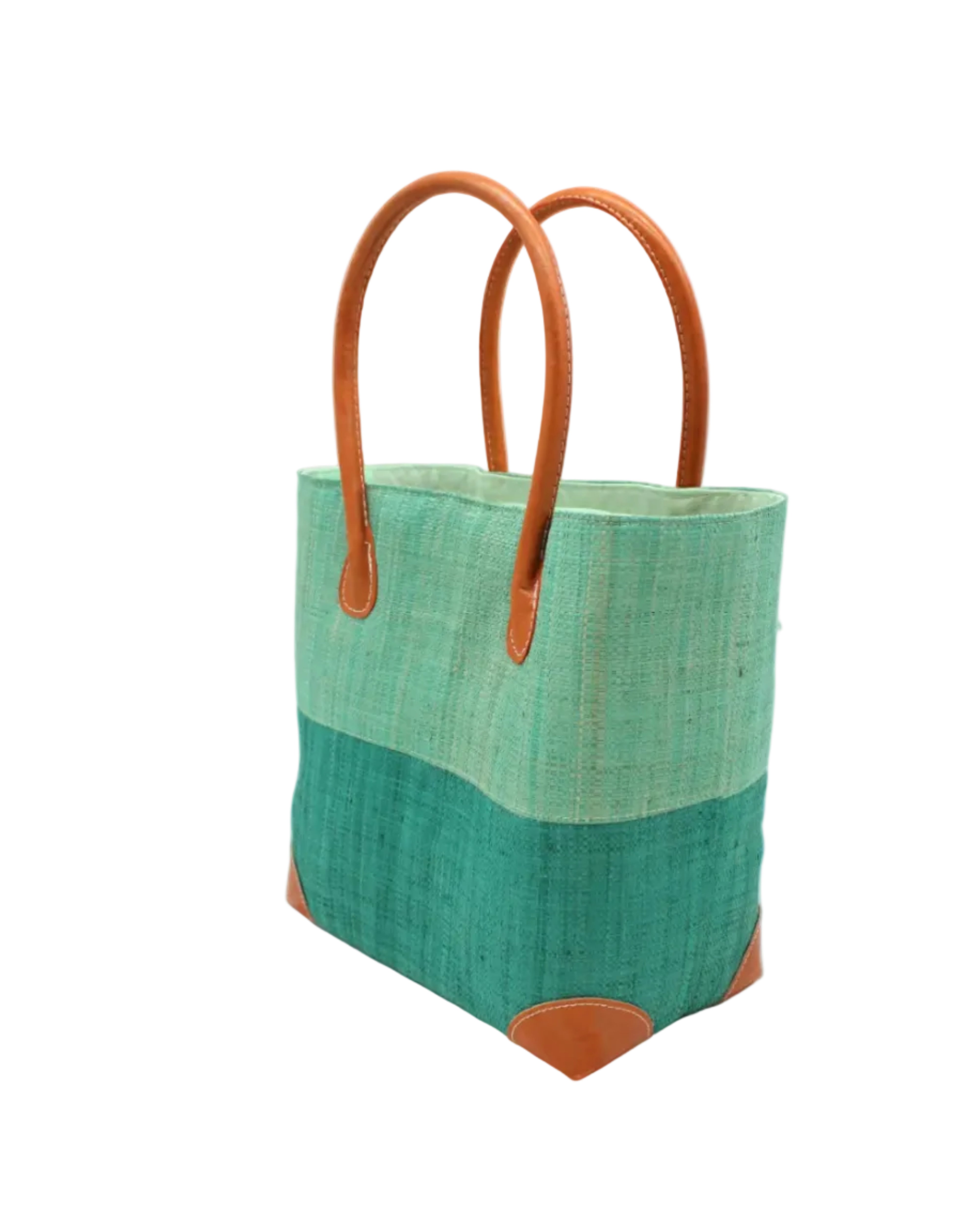Side view Trinidad Seafoam and Teal Two Tone Straw Basket Bag handmade loomed raffia palm fiber in a two tone color block pattern with teal dark/blue/green on the bottom half and seafoam light/blue/green on the top half of the bag with leather handles and accents beach bag tote purse - Shebobo
