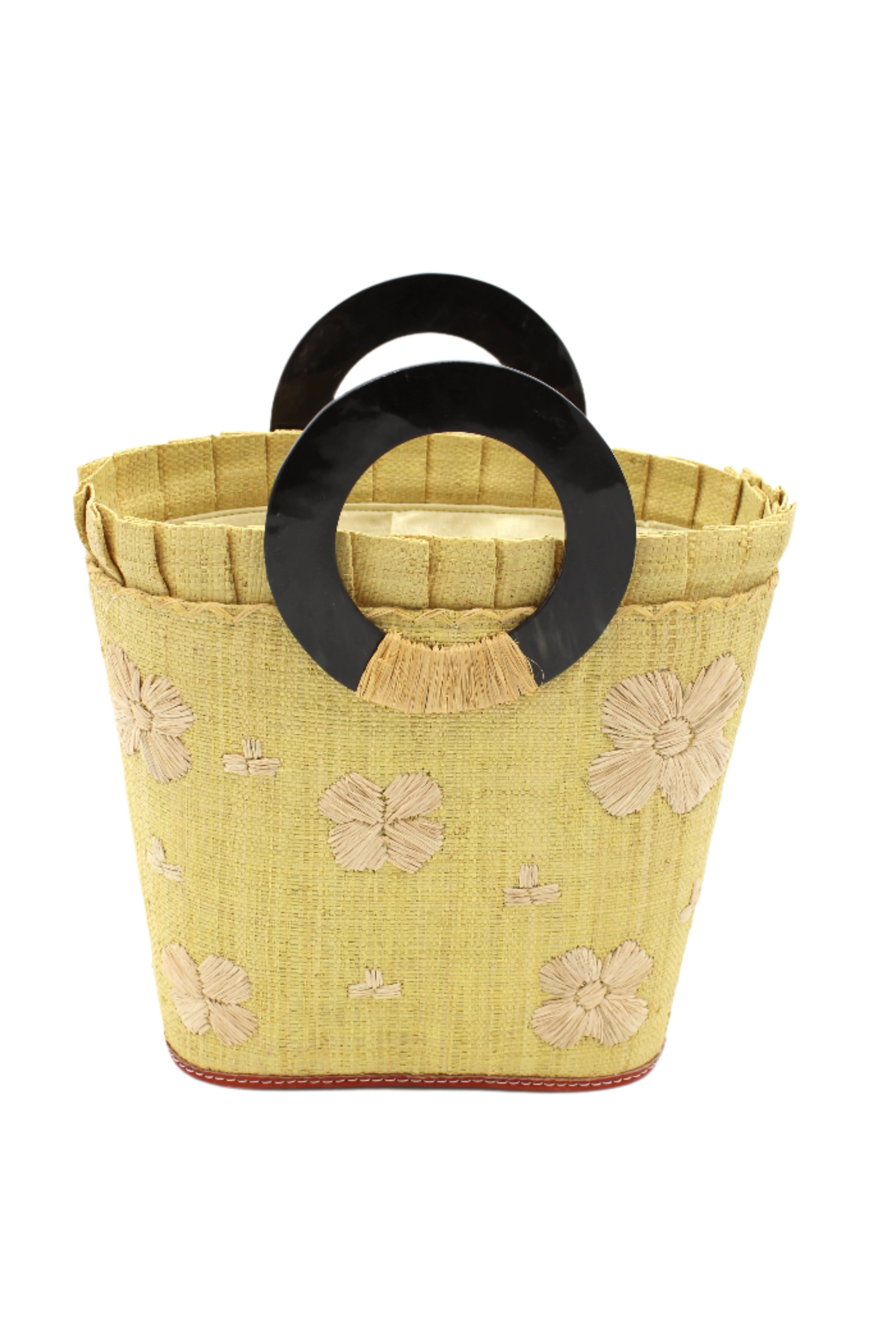 Tulum Straw Bucket Bag with Flower Embroidery and Horn Handle Butter Purse with Ruffle Edge handmade loomed raffia palm fiber in a solid hue of butter light/yellow with natural straw color hand embroidered floral pattern with multiple sized flowers and raffia ruffle on the opening handbag - Shebobo