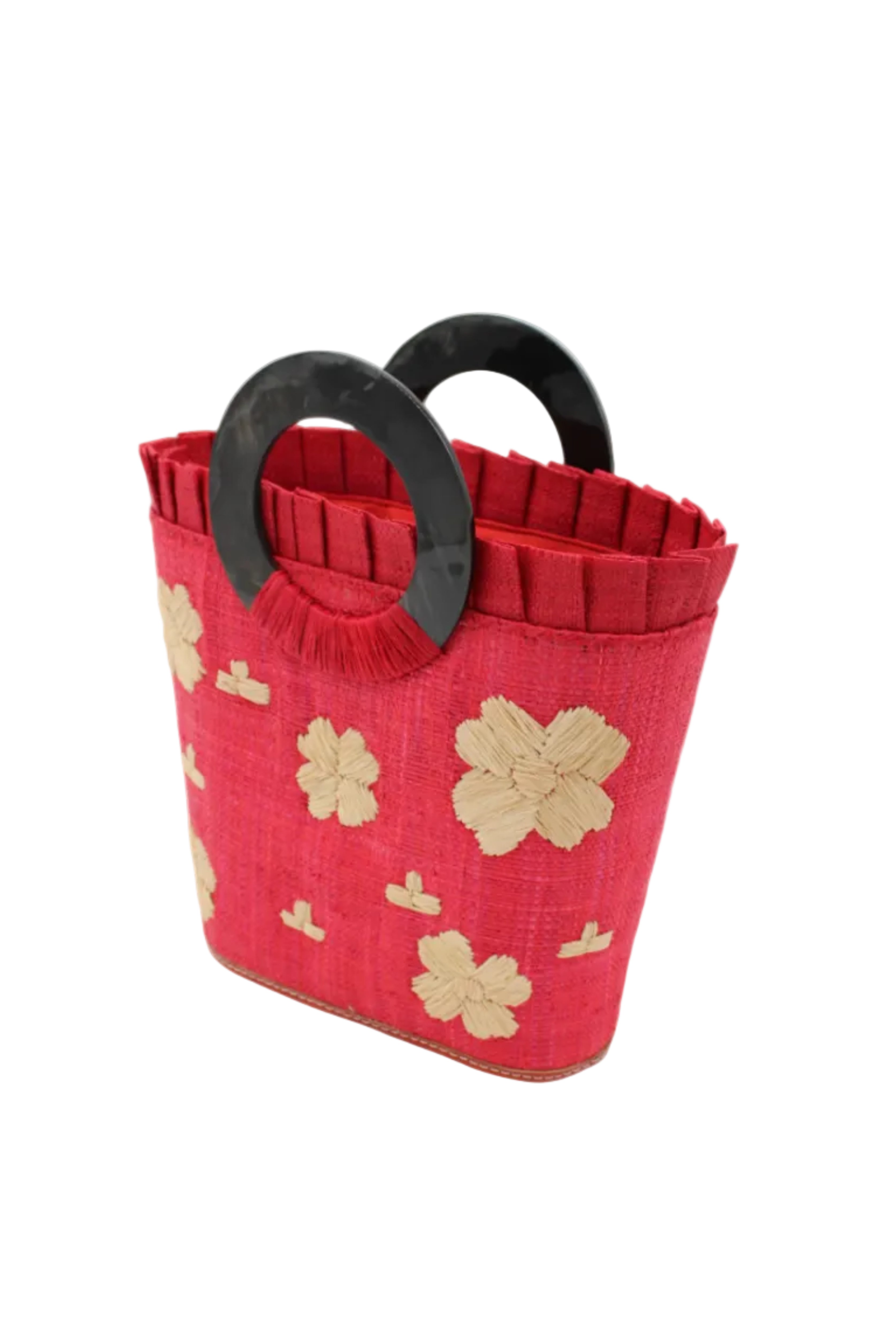 Side view Tulum Straw Bucket Bag with Flower Embroidery and Horn Handle Red Purse with Ruffle Edge handmade loomed raffia palm fiber in a solid hue of red with natural straw color hand embroidered floral pattern with multiple sized flowers and raffia ruffle on the opening handbag - Shebobo