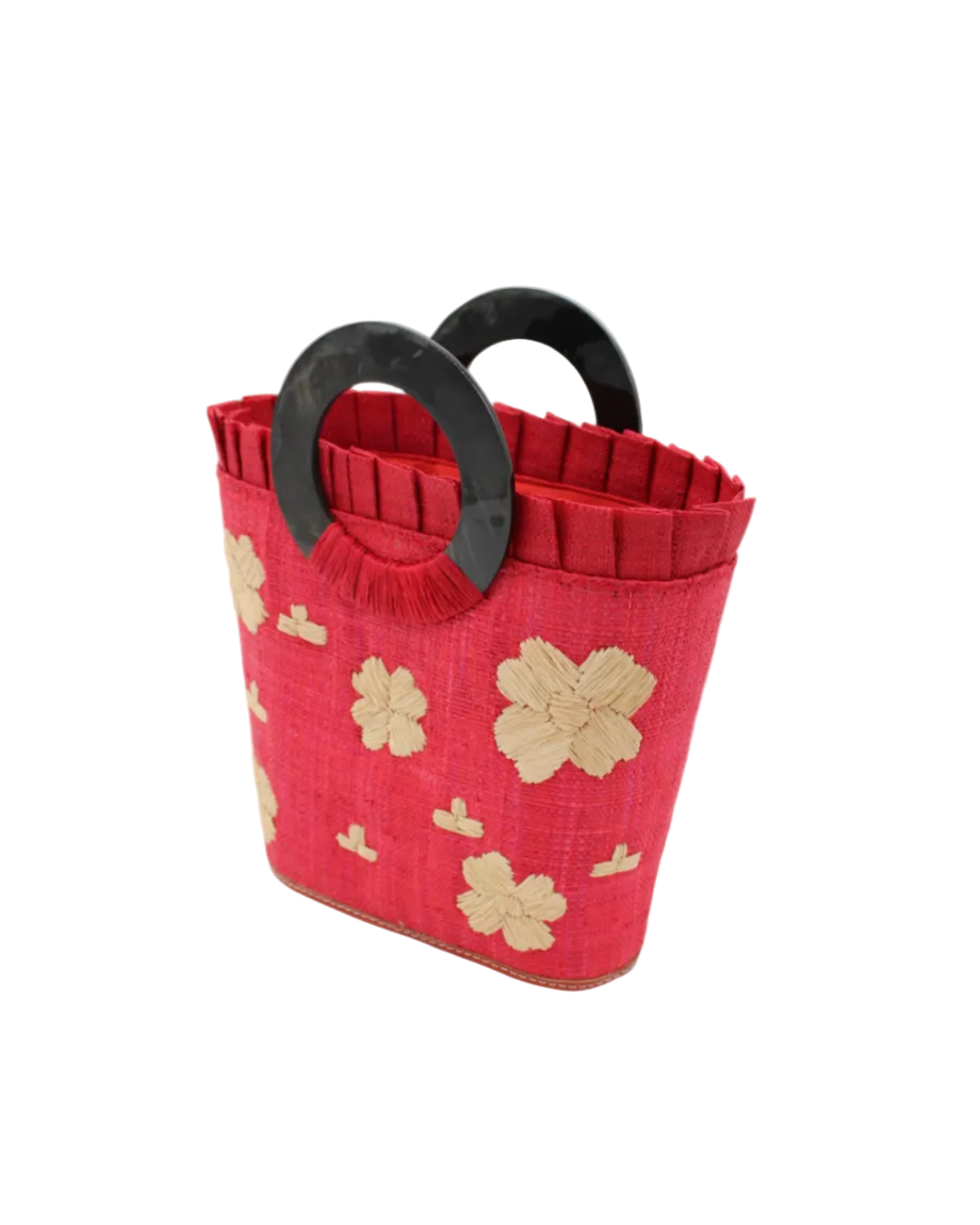 Side view Tulum Straw Bucket Bag with Flower Embroidery and Horn Handle Red Purse with Ruffle Edge handmade loomed raffia palm fiber in a solid hue of red with natural straw color hand embroidered floral pattern with multiple sized flowers and raffia ruffle on the opening handbag - Shebobo